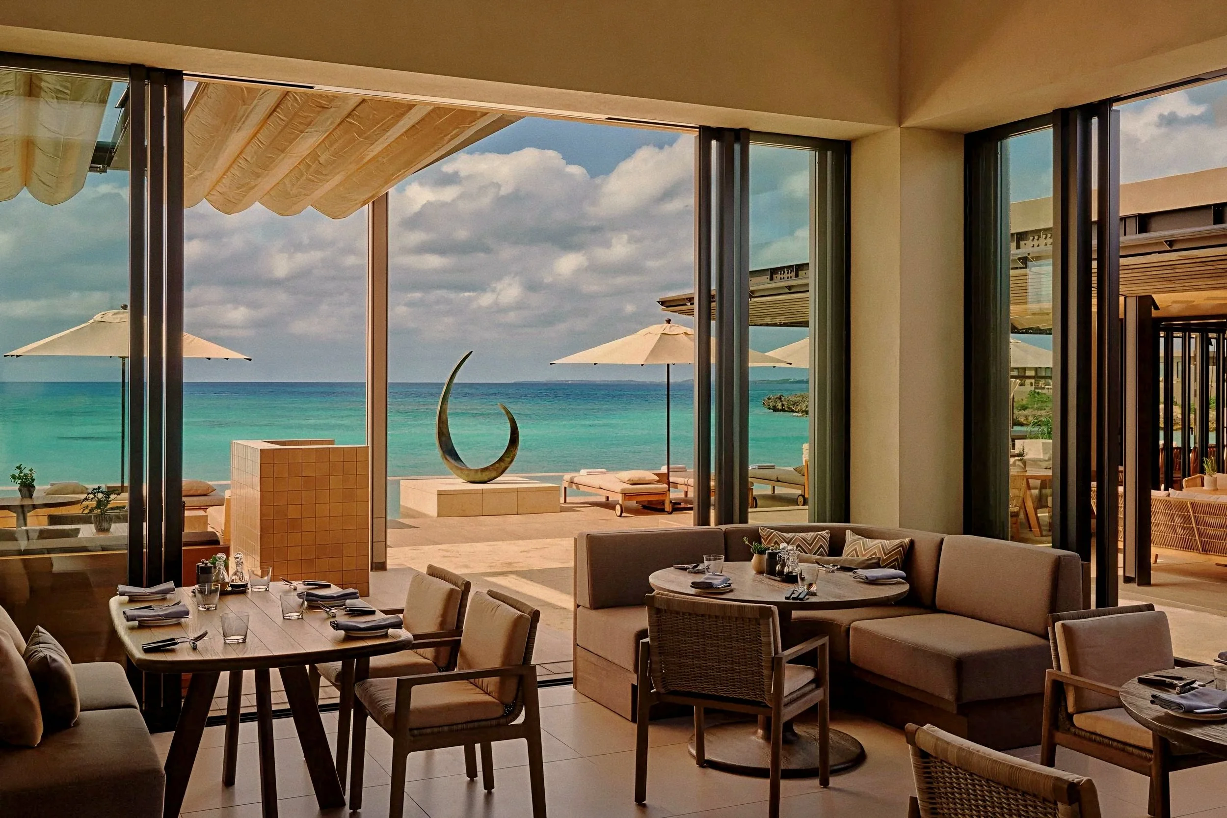 Oceanfront luxury dining pavilion at Rosewood Miyakojima resort in Okinawa, Japan, overlooking the Ryukyu sea.