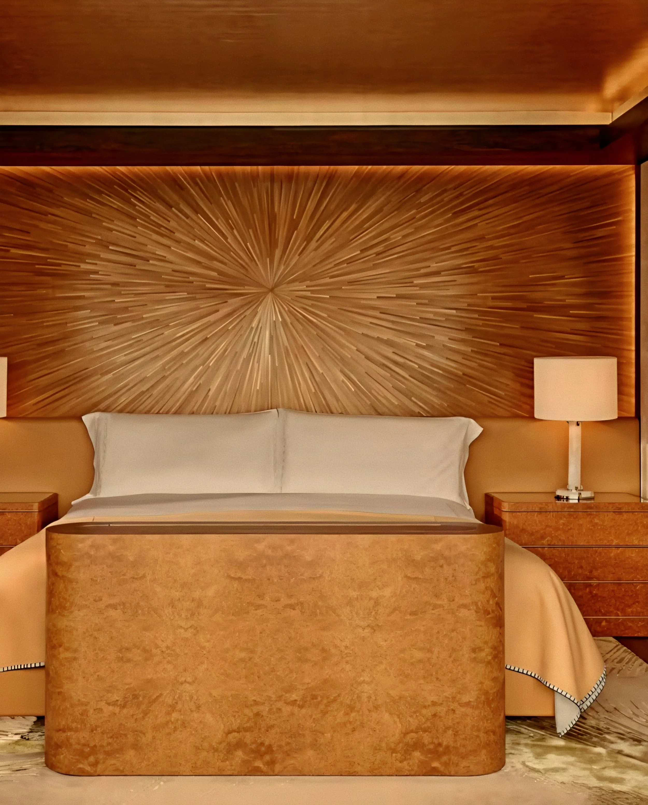 Principal bedroom with sunburst marquetry by Rémi Tessier at Claridge's Hotel Mayfair London.
