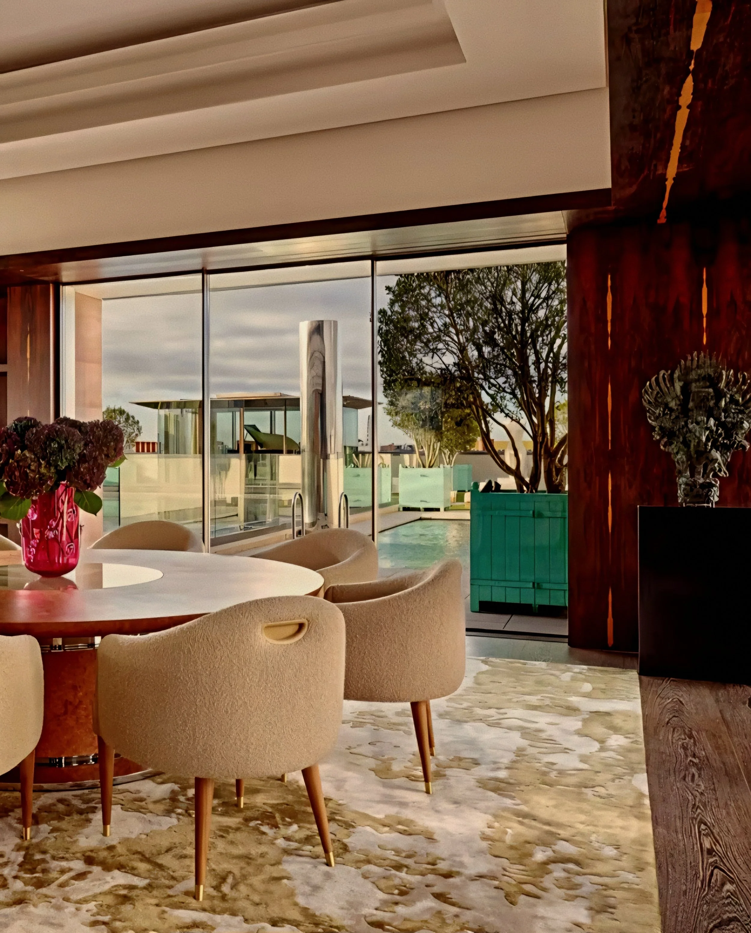 Intimate dining gallery with custom millwork by Rémi Tessier at Claridge's Hotel Mayfair London.