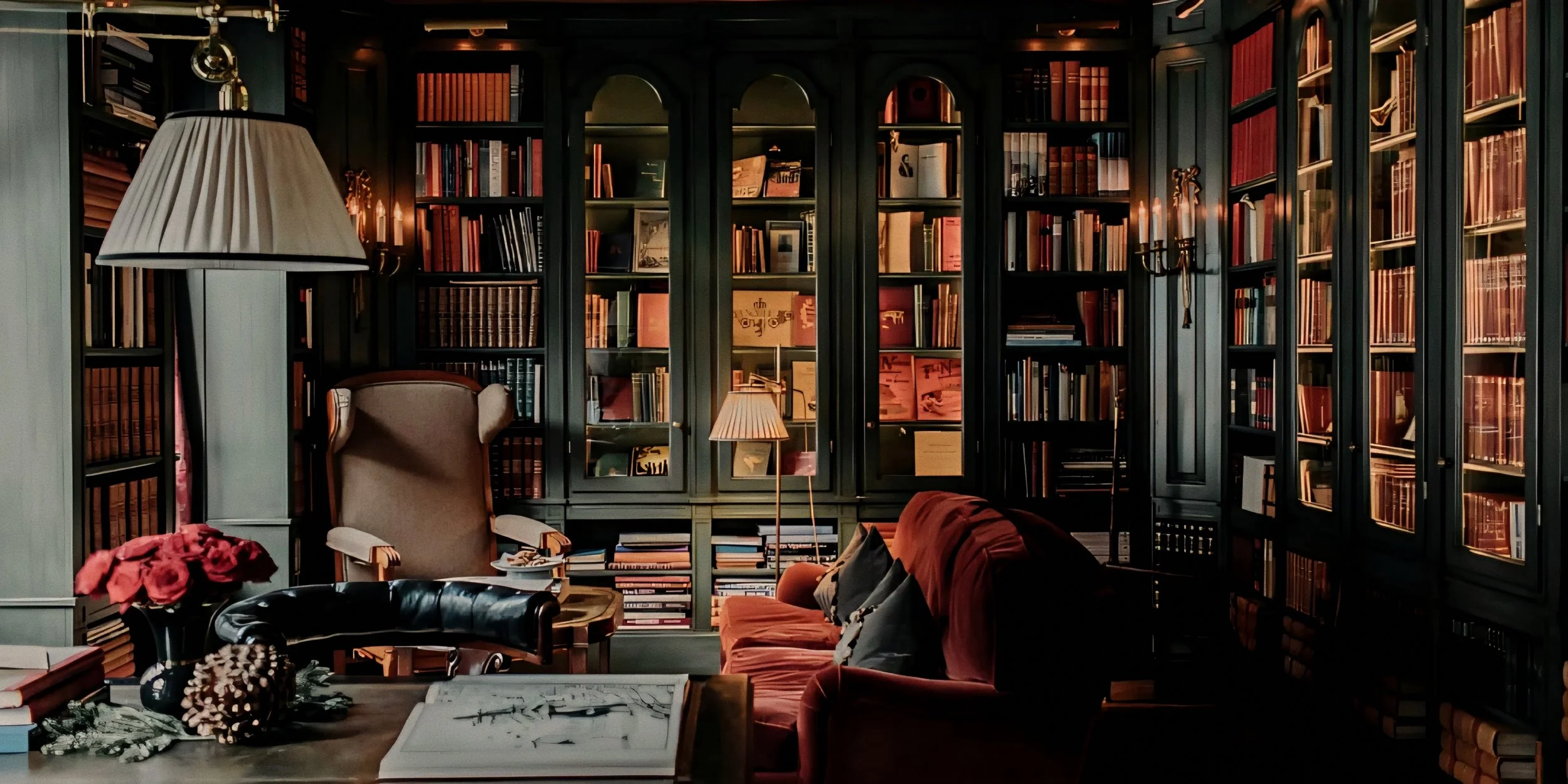 Floor-to-ceiling green timber bookshelves in historic library at Hotel Union Øye Norway fjords