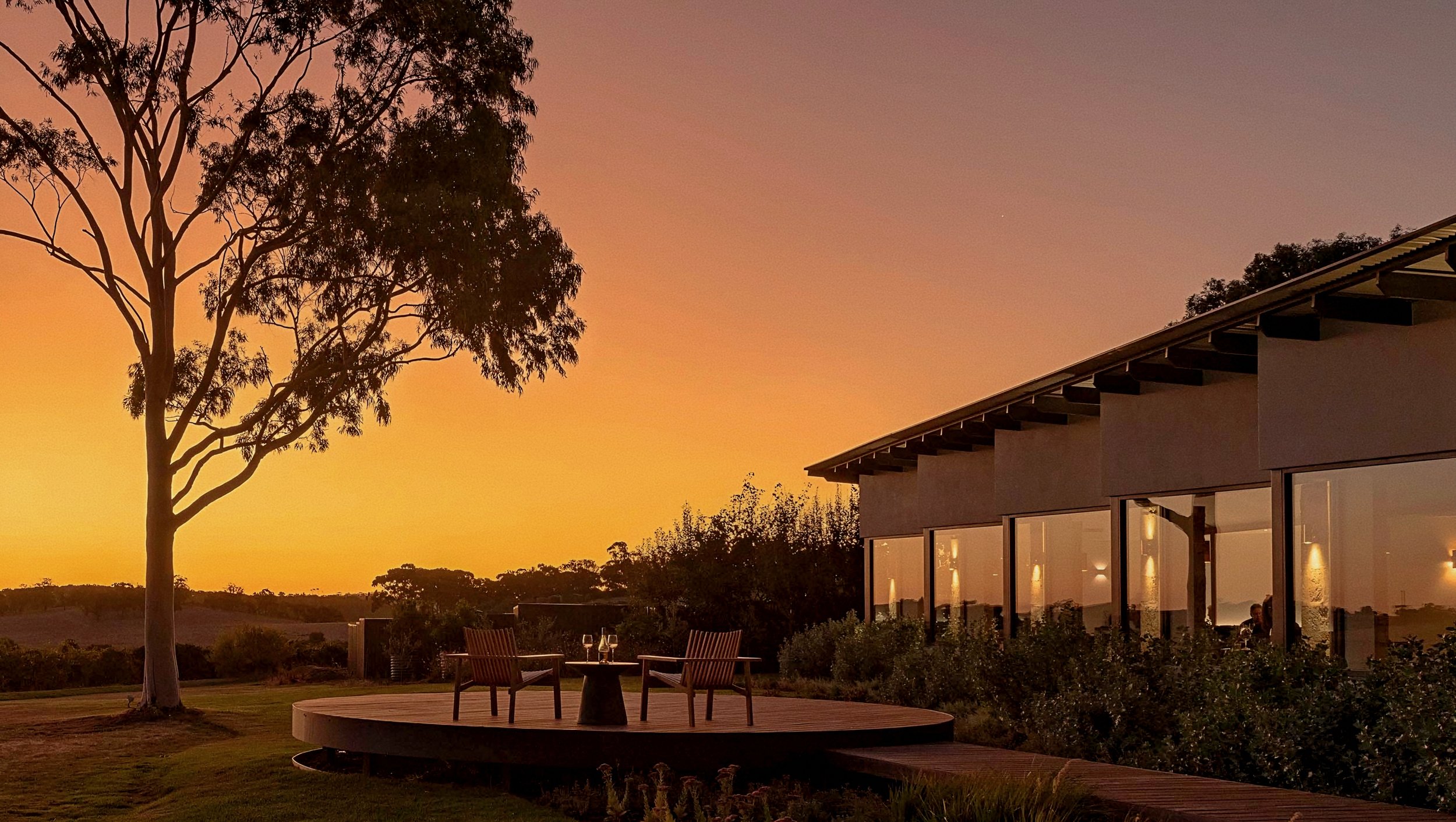 The Louise beckons luxury vineyard resort terrace sunset in Marananga Barossa Valley South Australia.