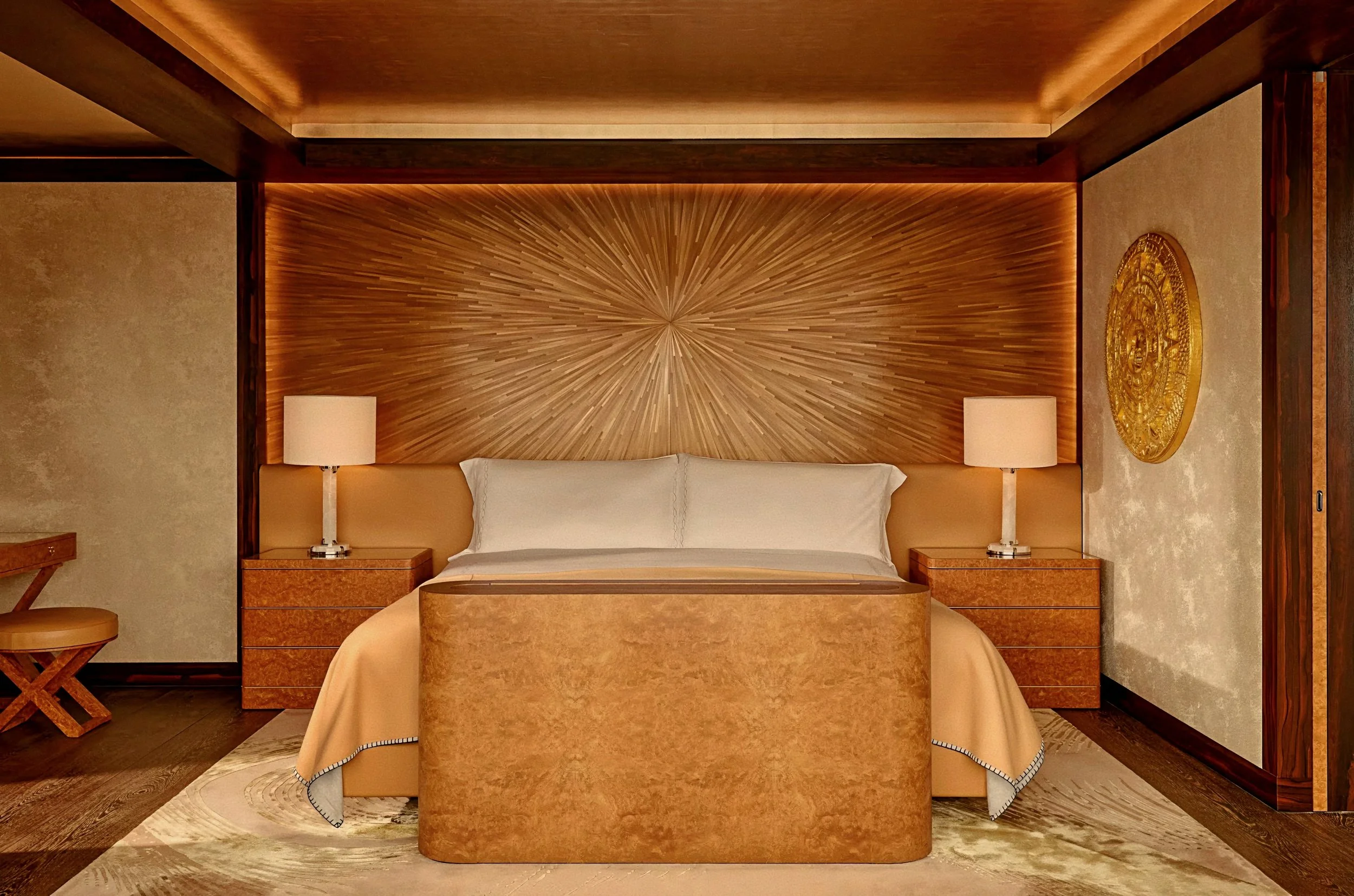 Principal bedroom with sunburst marquetry by Rémi Tessier at Claridge's Hotel Mayfair London.