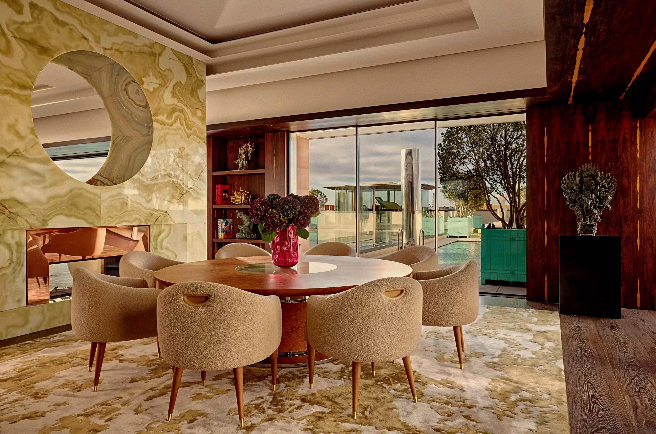 Intimate dining gallery with custom millwork by Rémi Tessier at Claridge's Hotel Mayfair London.