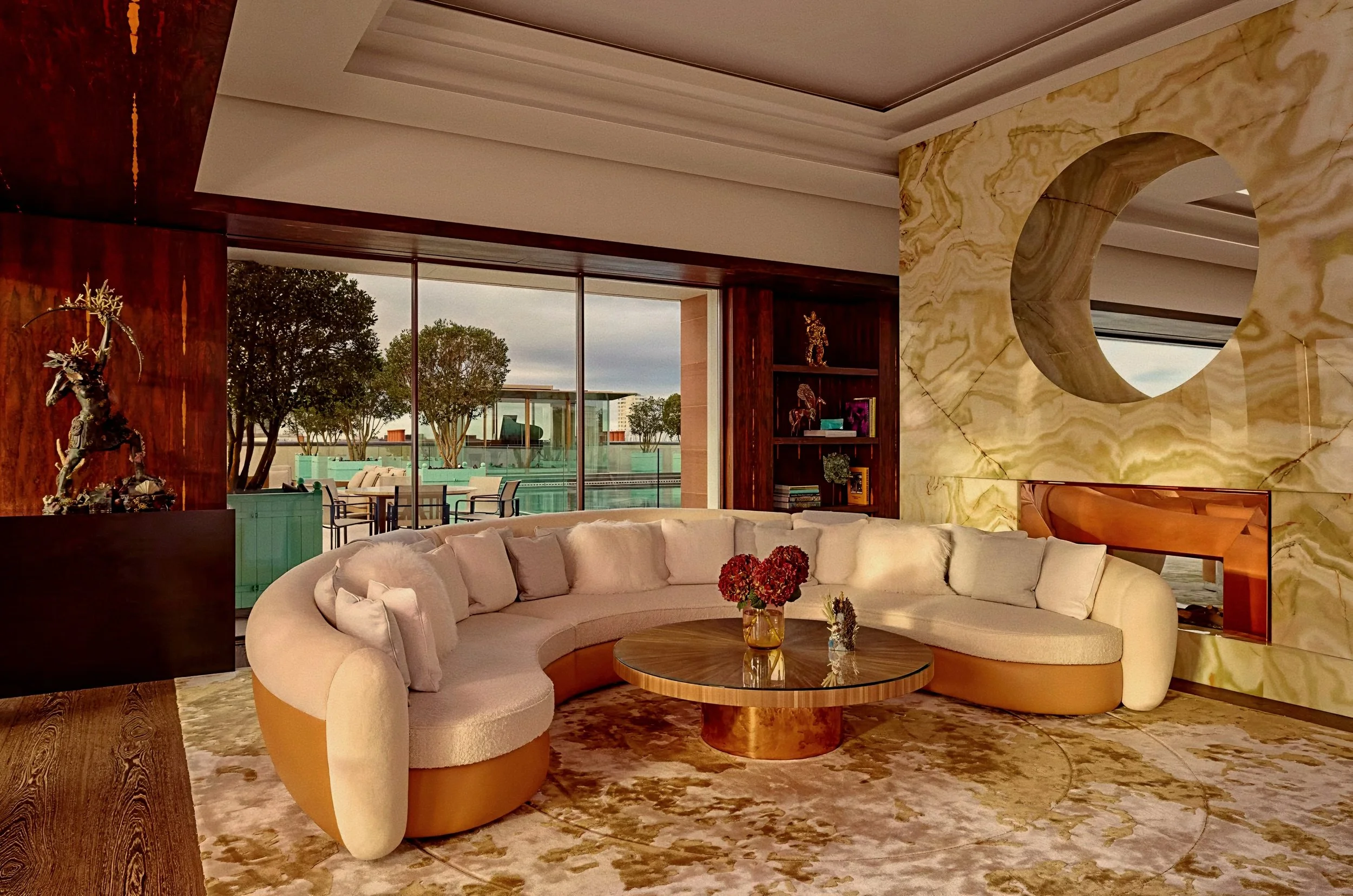 Grand salon with green onyx fireplace by Rémi Tessier at Claridge's Hotel Mayfair London Penthouse.