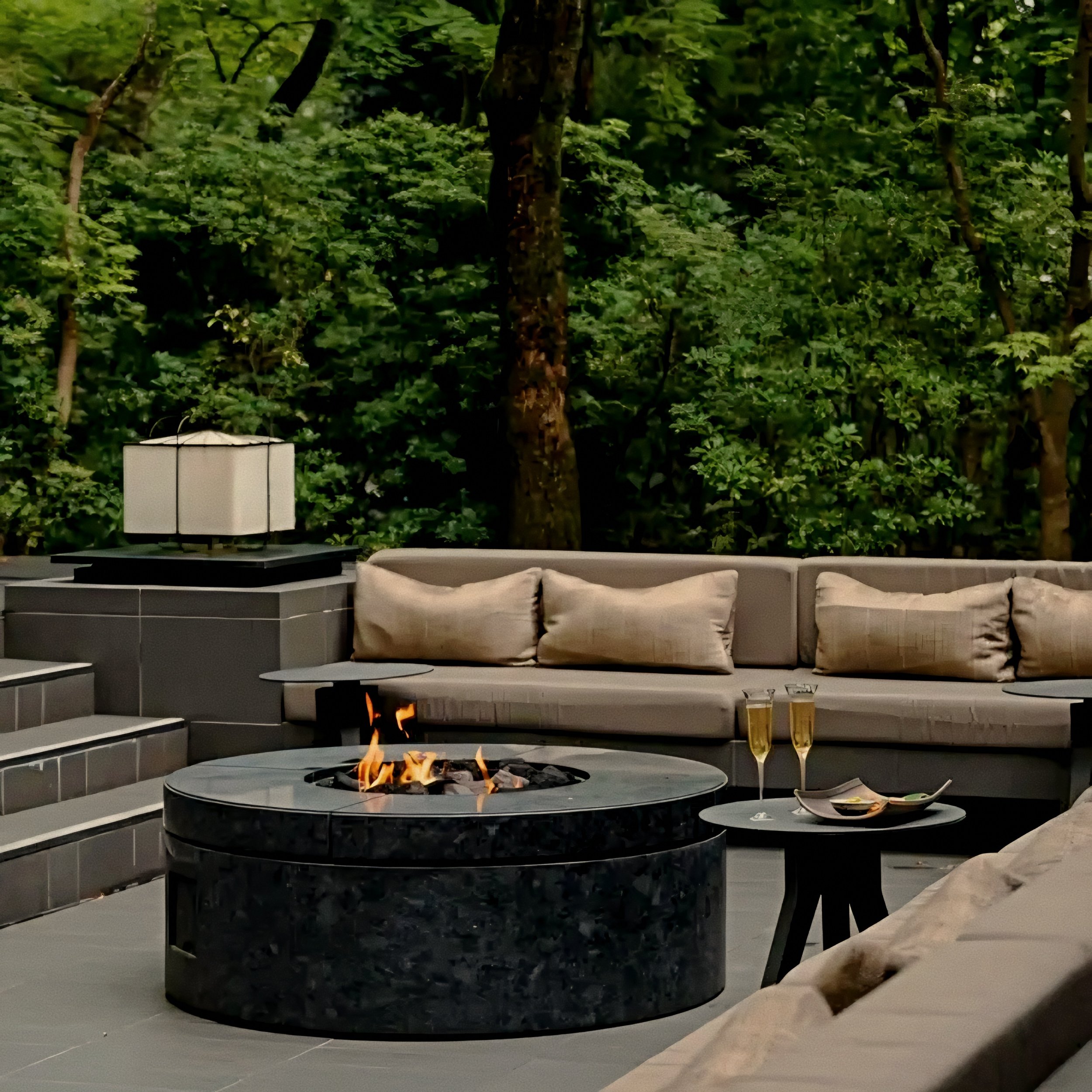 Fire pit terrace and moss garden at Aman Kyoto luxury onsen spa and ryokan in Japan.