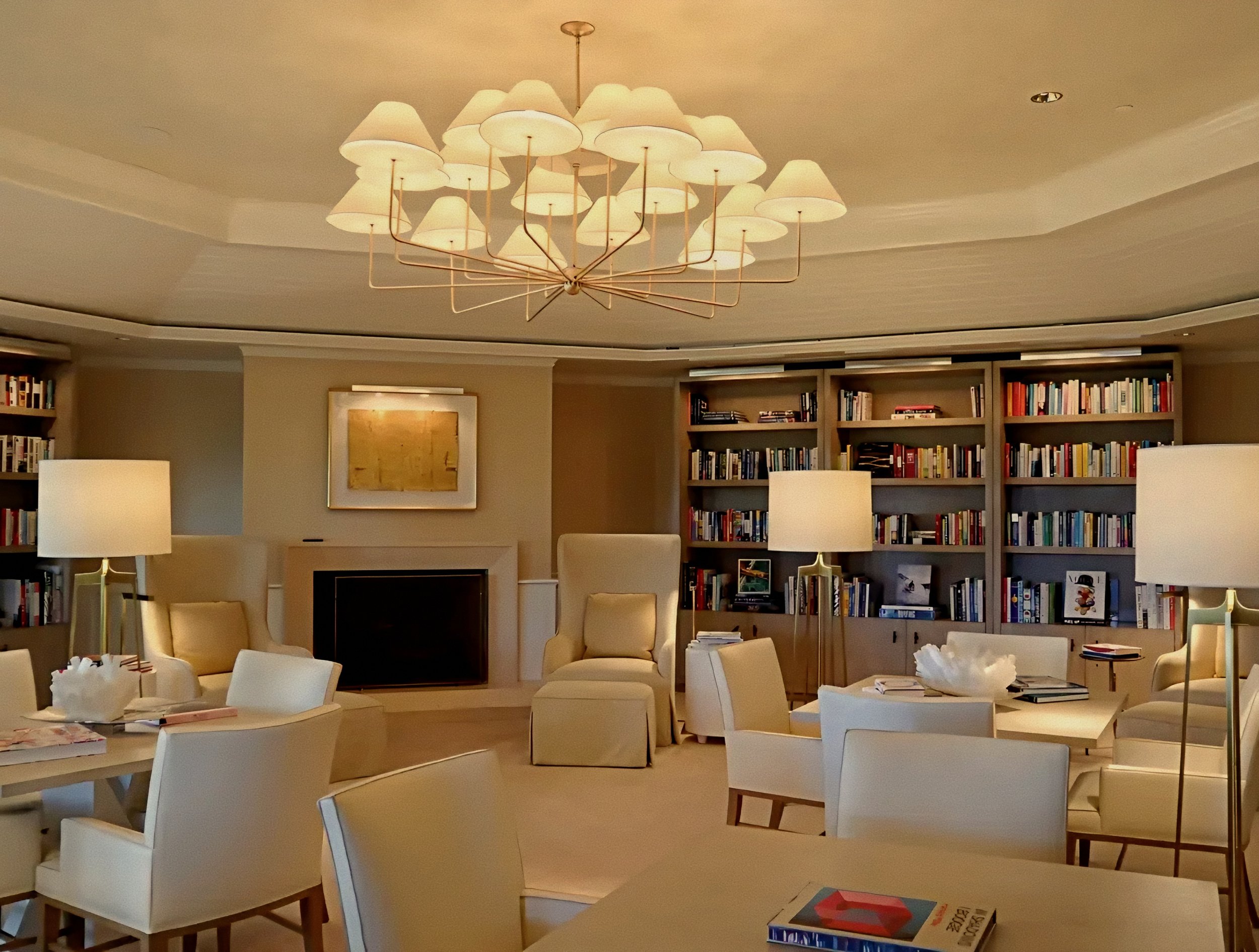 Ivory reading chairs and paper umbrella light library Sensei Lanai, A Four Seasons Resort, is a luxury wellness and spa retreat in Kōʻele, Hawaii.