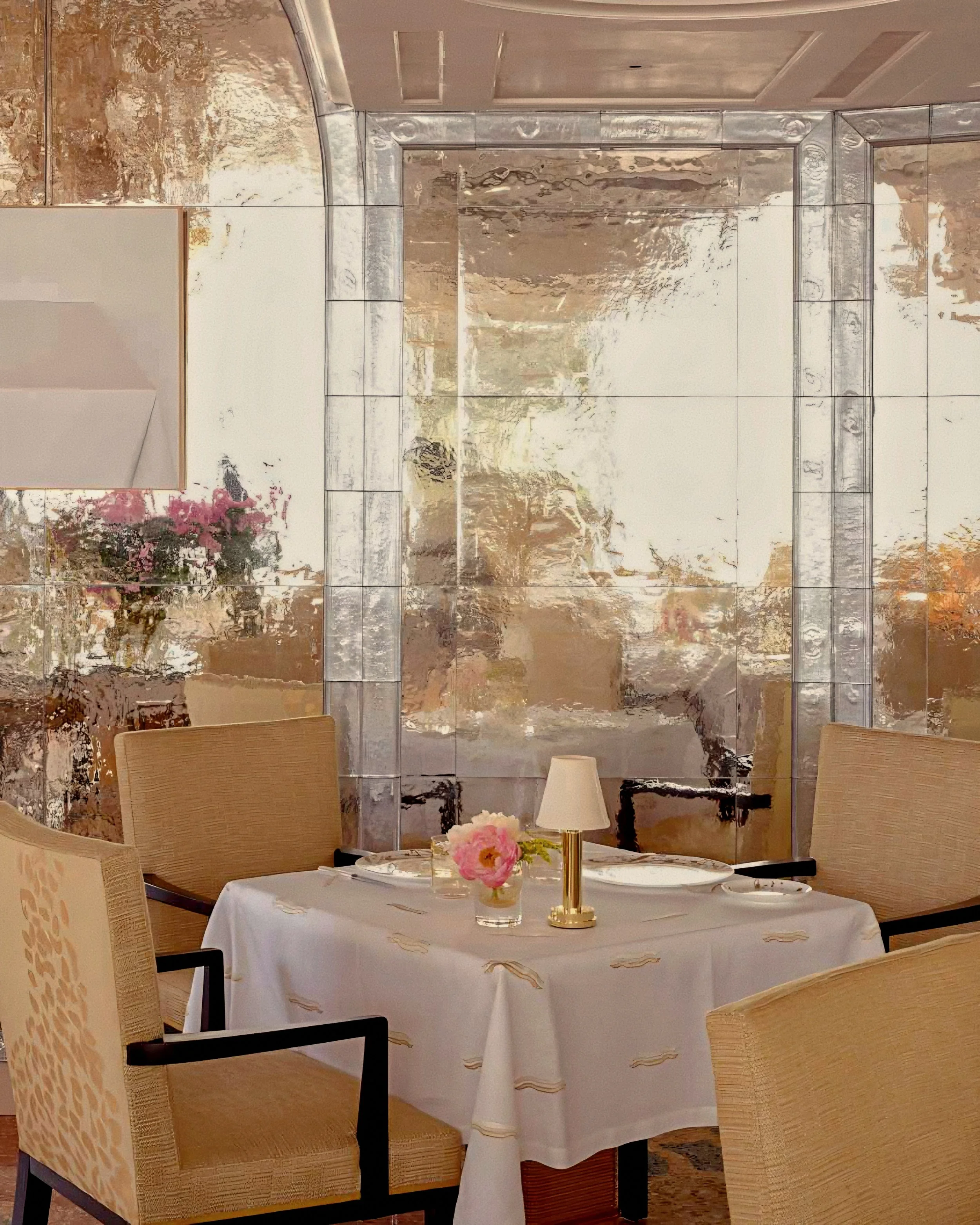 Hand-patinated gold glass paneled wall at Oro Michelin-Starred Restaurant Belmond Hotel Cipriani Venice, Italy.