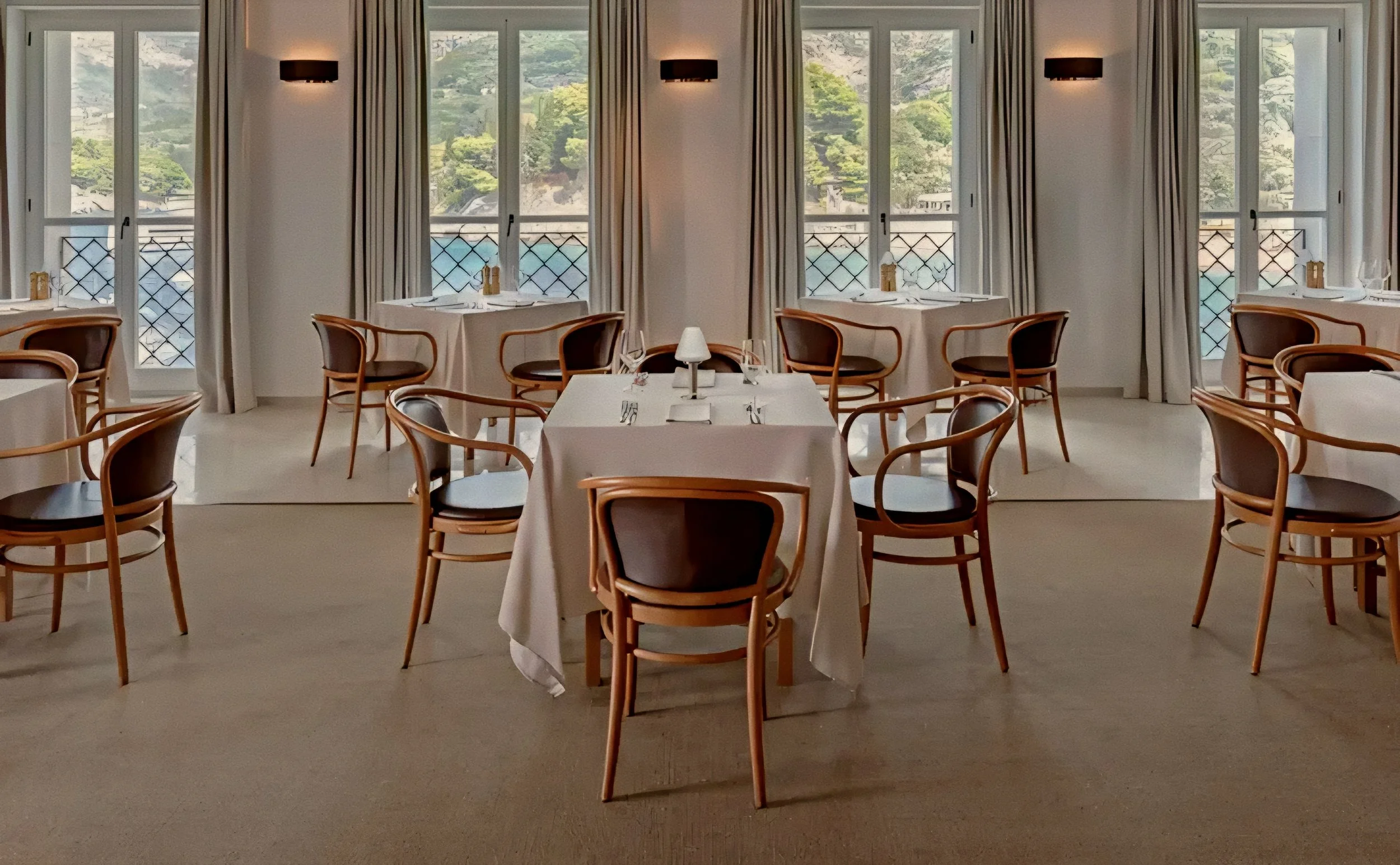 Classic bentwood chairs at Arva restaurant Aman Sveti Stefan Luxury Resort in Montenegro.