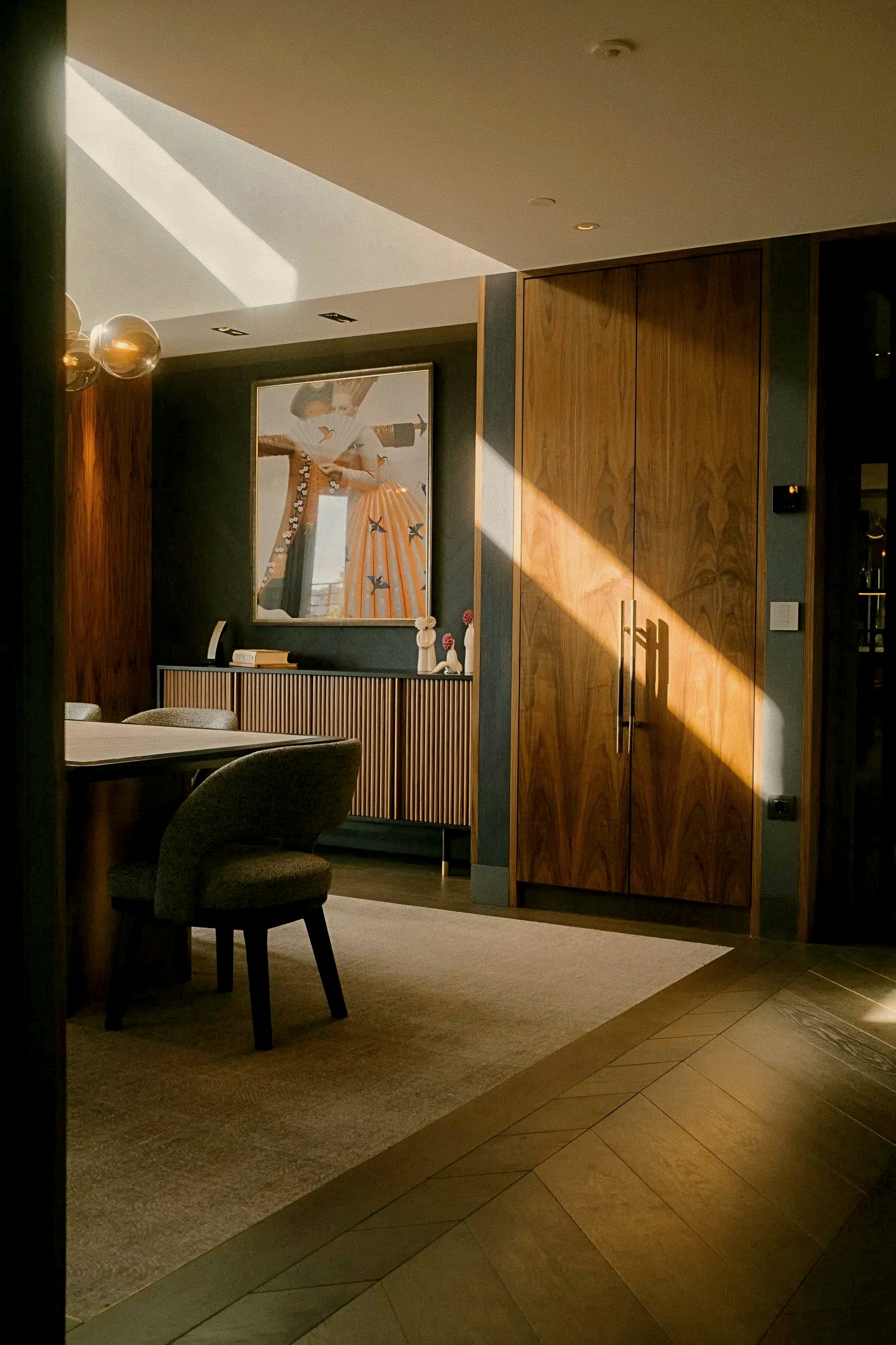 Sunlit luxury interior alcove with walnut millwork at Rosewood Villa Magna Salamanca Madrid Spain estate.