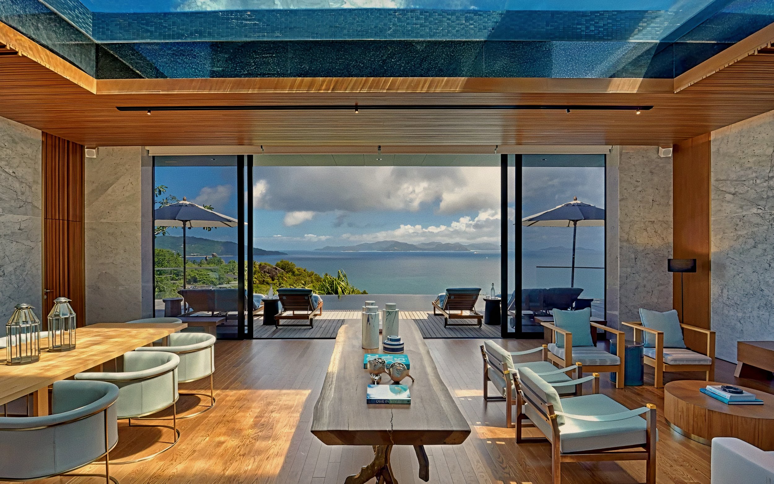 Glass-bottom pool living space at Six Senses Zil Pasyon, Felicite Island luxury hotel in Seychelles.