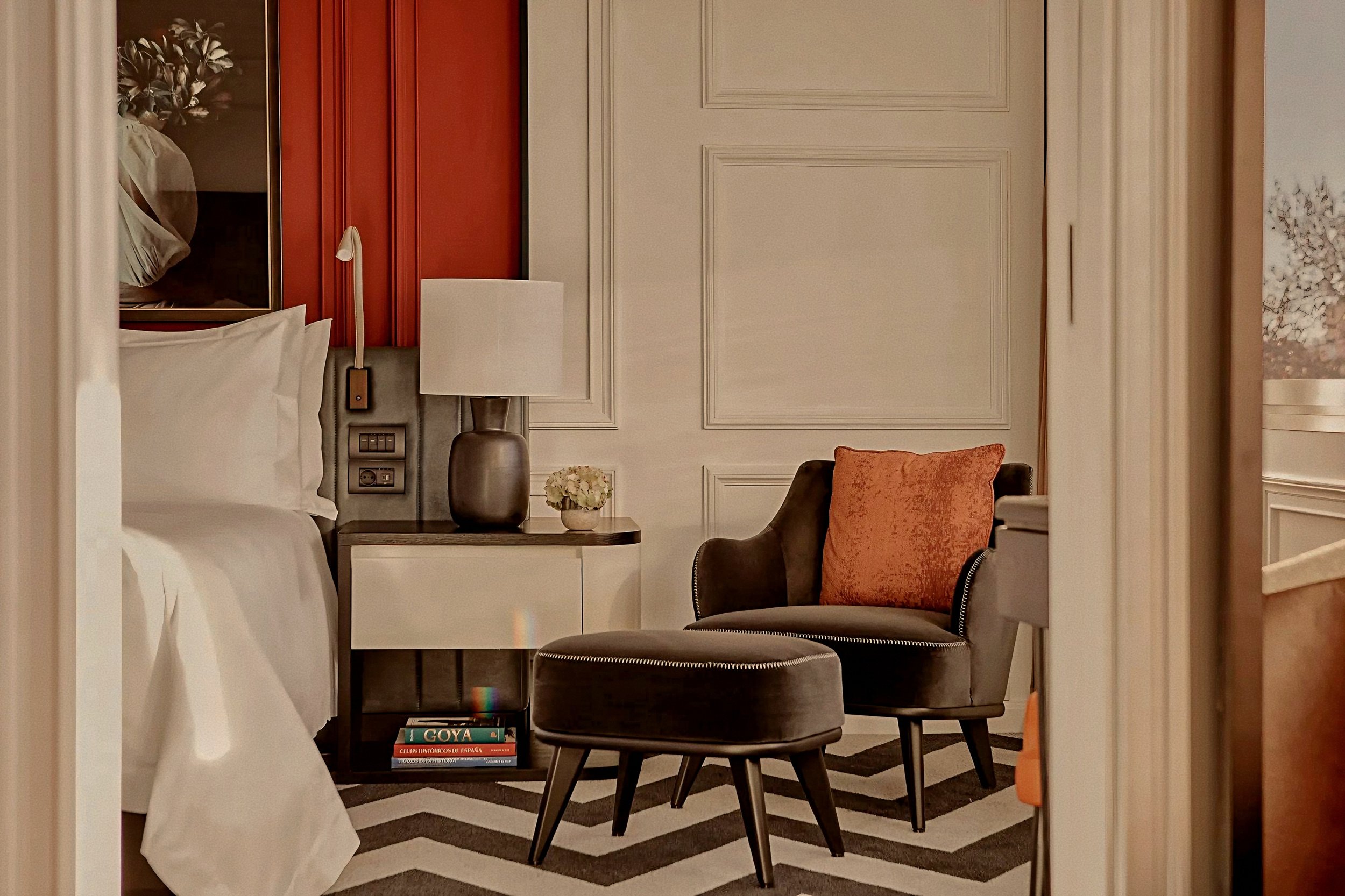 Tailored suite reading corner with velvet armchair at Rosewood Villa Magna Salamanca Madrid Spain hotel.