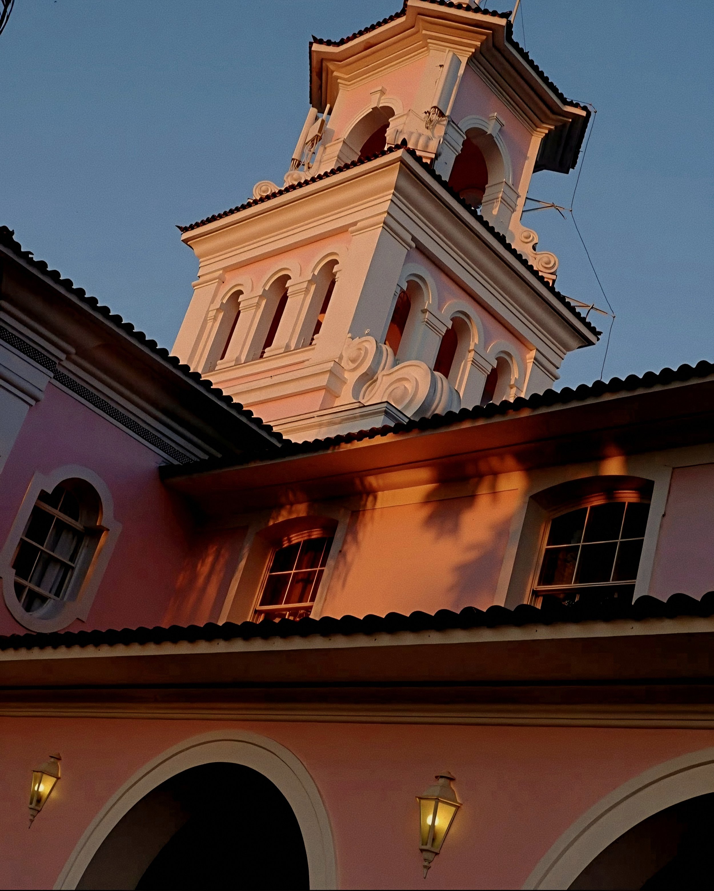 Historic pink colonial tower of Hotel das Cataratas A Belmond Hotel in Iguassu Falls Brazil.