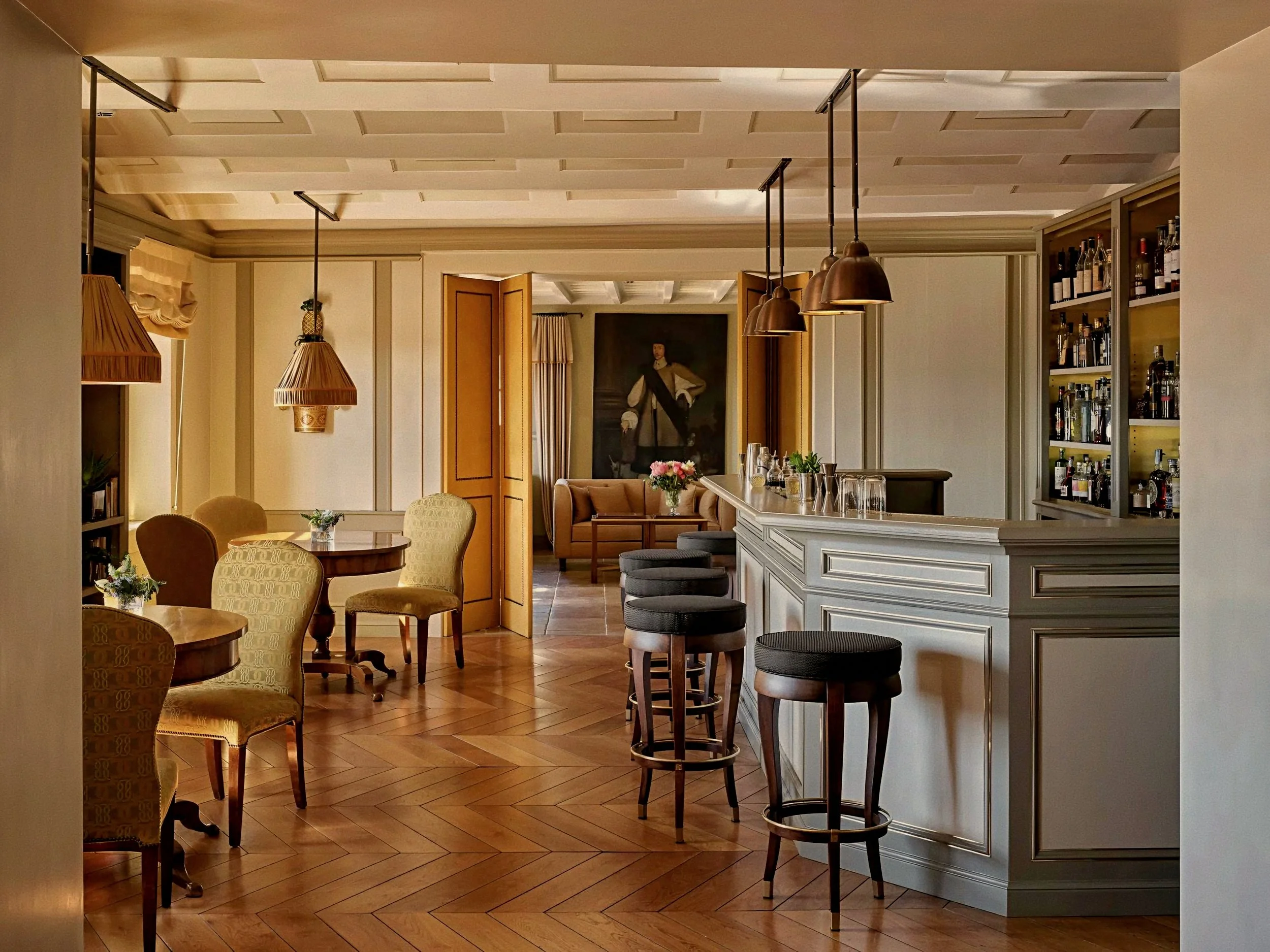 The Lobby Bar with chevron floors at Castiglion del Bosco, A Rosewood Hotel, Val d'Orcia, Tuscany, Italy.