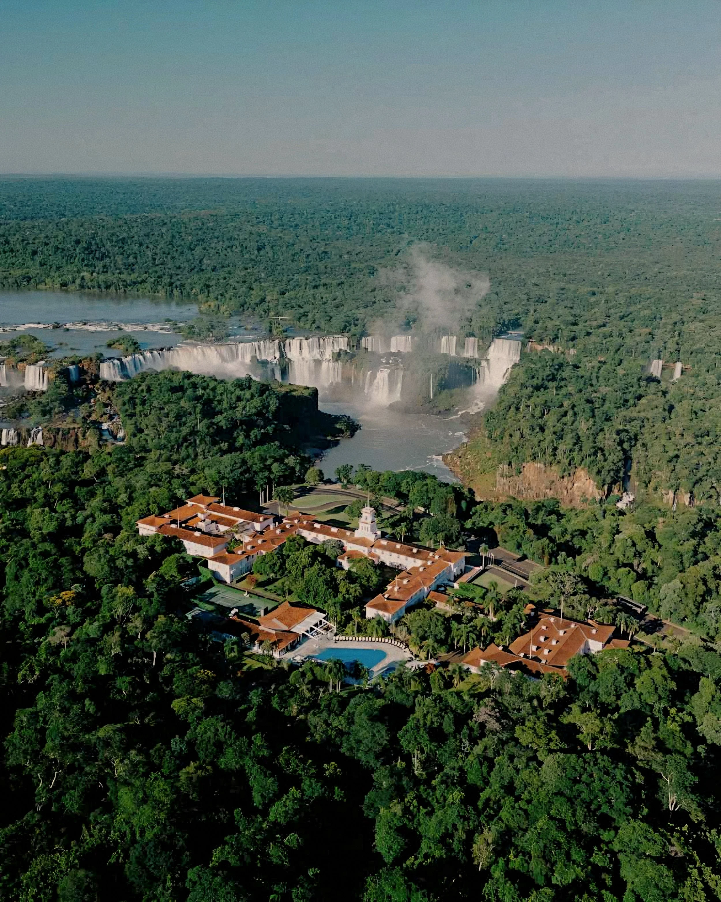 Aerial view of Hotel das Cataratas Belmond inside Iguassu National Park rainforest Brazil.