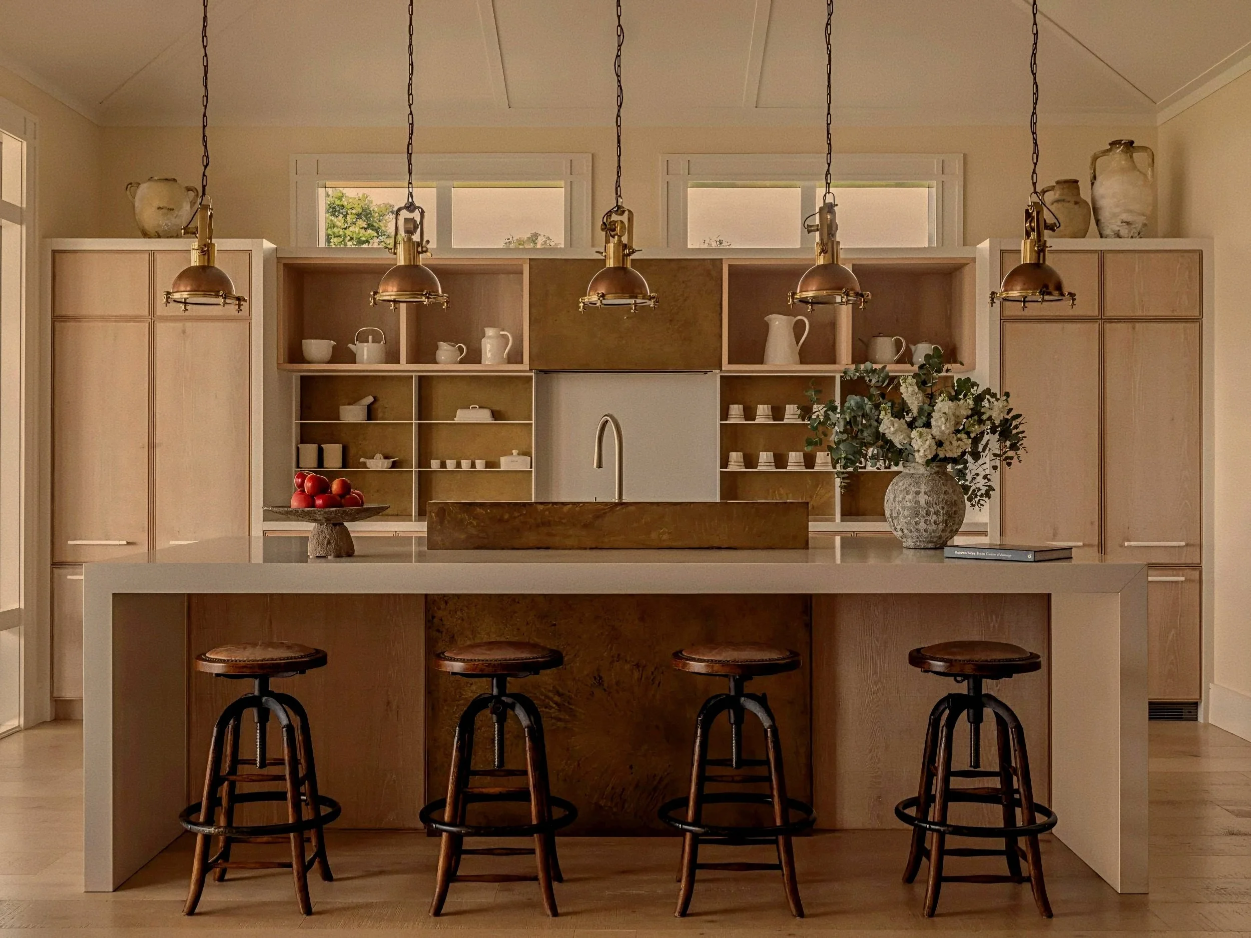 Bespoke blonde oak villa kitchen by interior designer Virginia Fisher at Rosewood Kauri Cliffs, New Zealand.