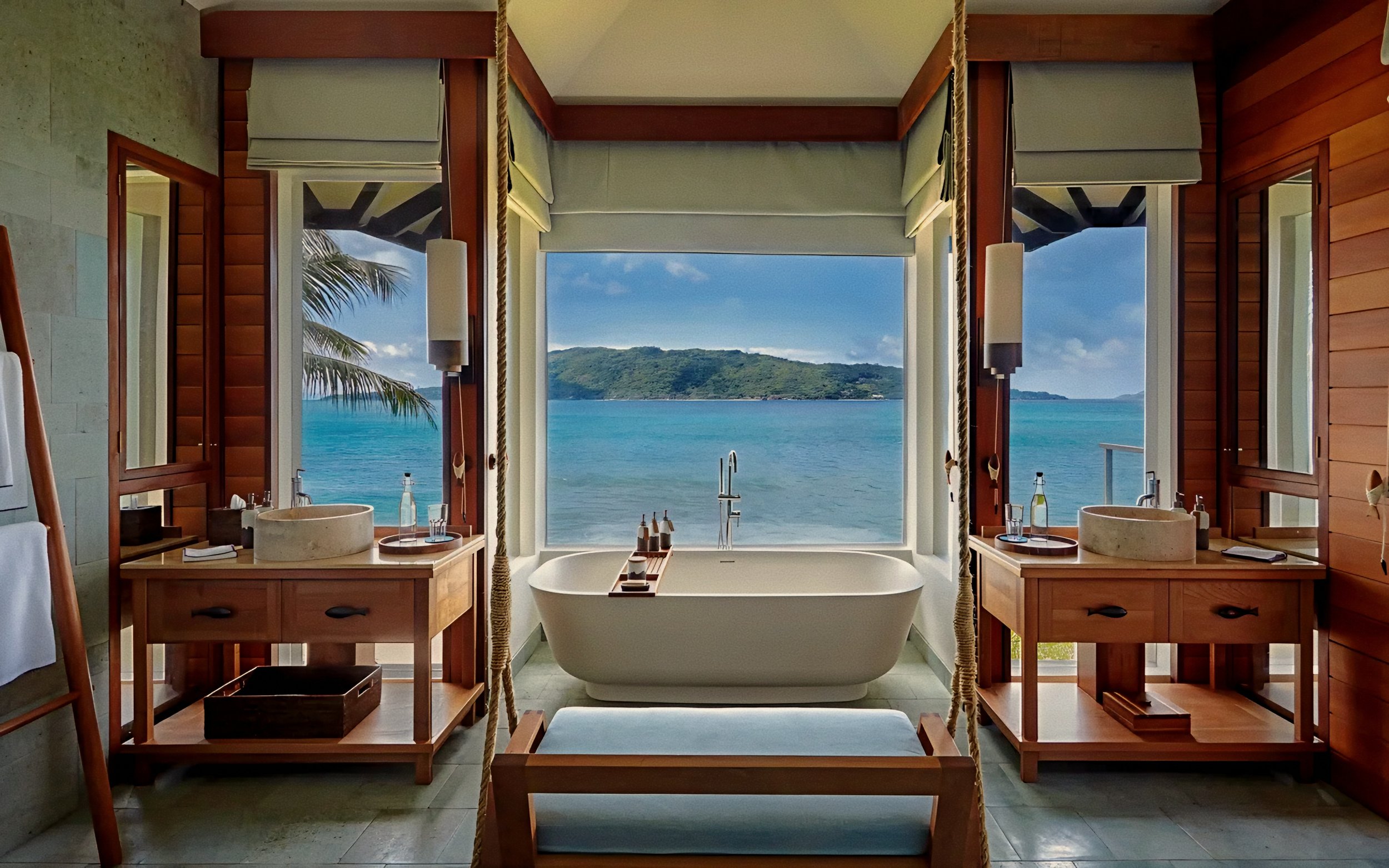 Sculptural soaking tub and ocean views at Six Senses Zil Pasyon, Felicite Island luxury hotel in Seychelles.