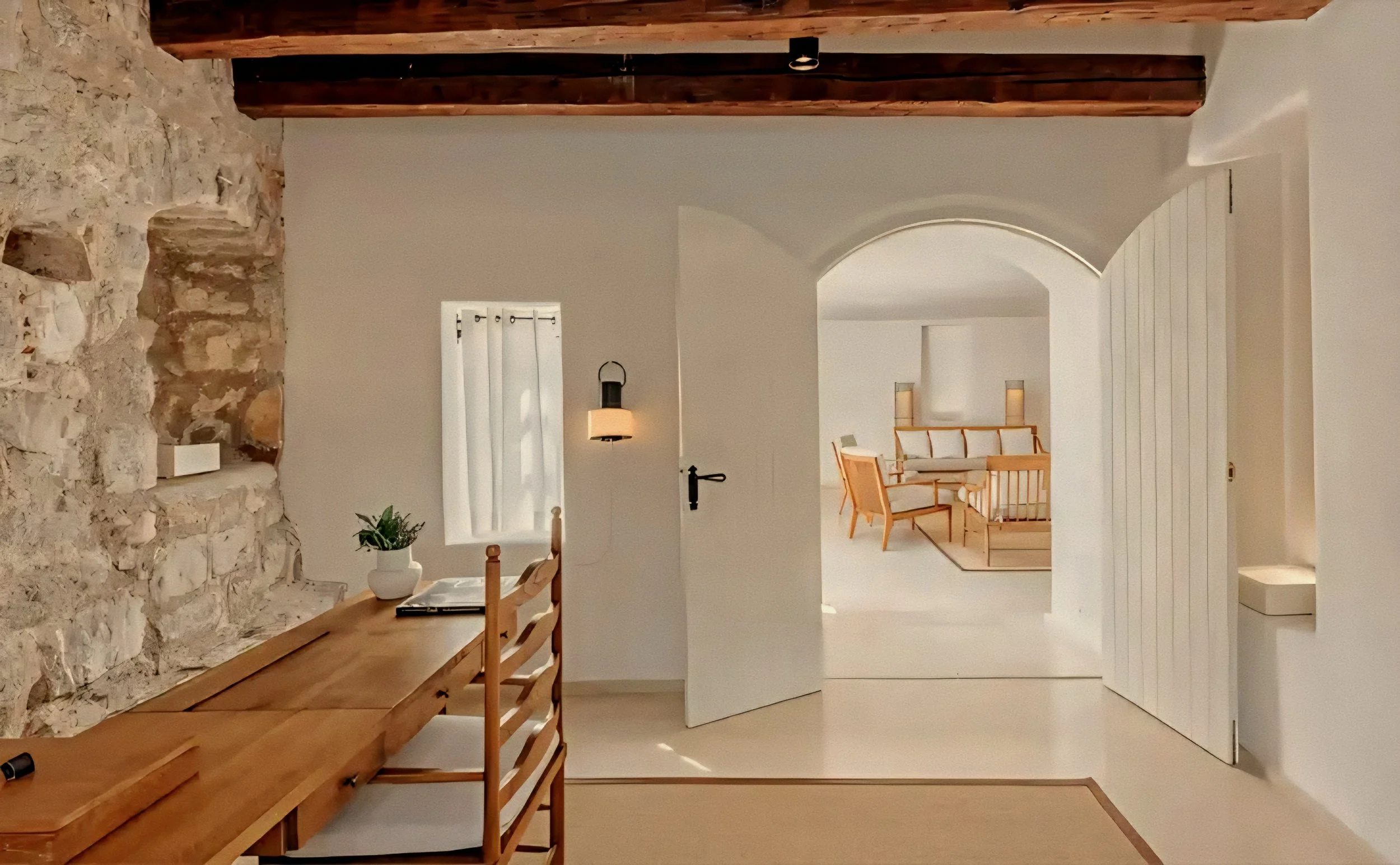Rustic stone alcove and arched white portal Aman Sveti Stefan Luxury Resort in Montenegro.