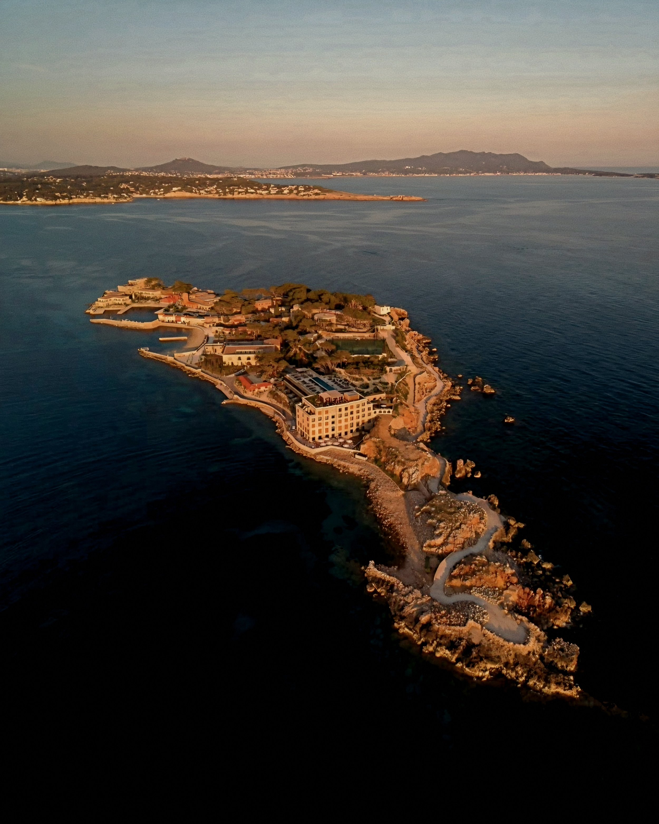 Aerial perspective of Zannier Île de Bendor private island resort off the French Riviera coast.
