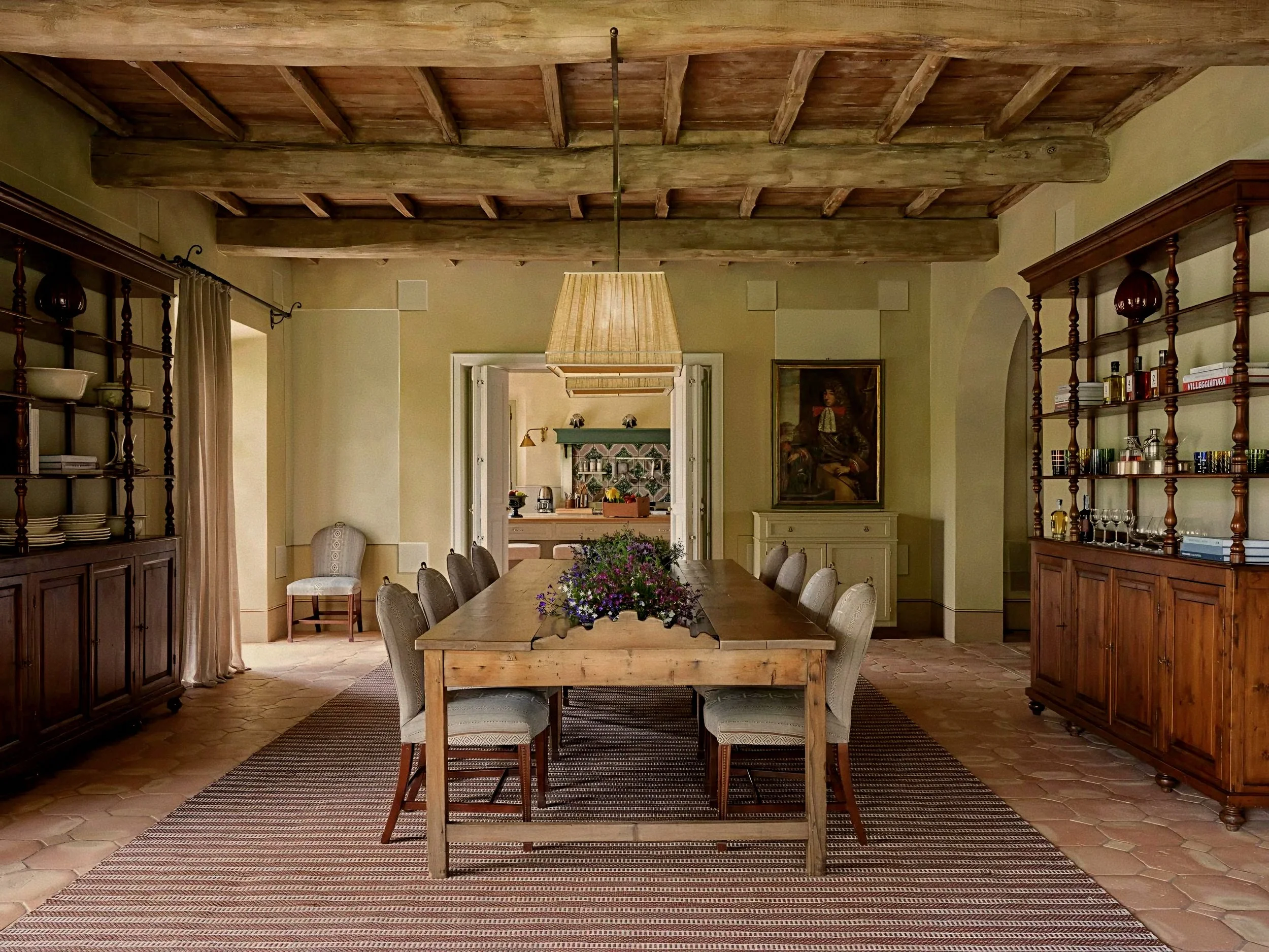 Rustic dining room with wood beams at Castiglion del Bosco, A Rosewood Hotel, Val d'Orcia, Tuscany, Italy.