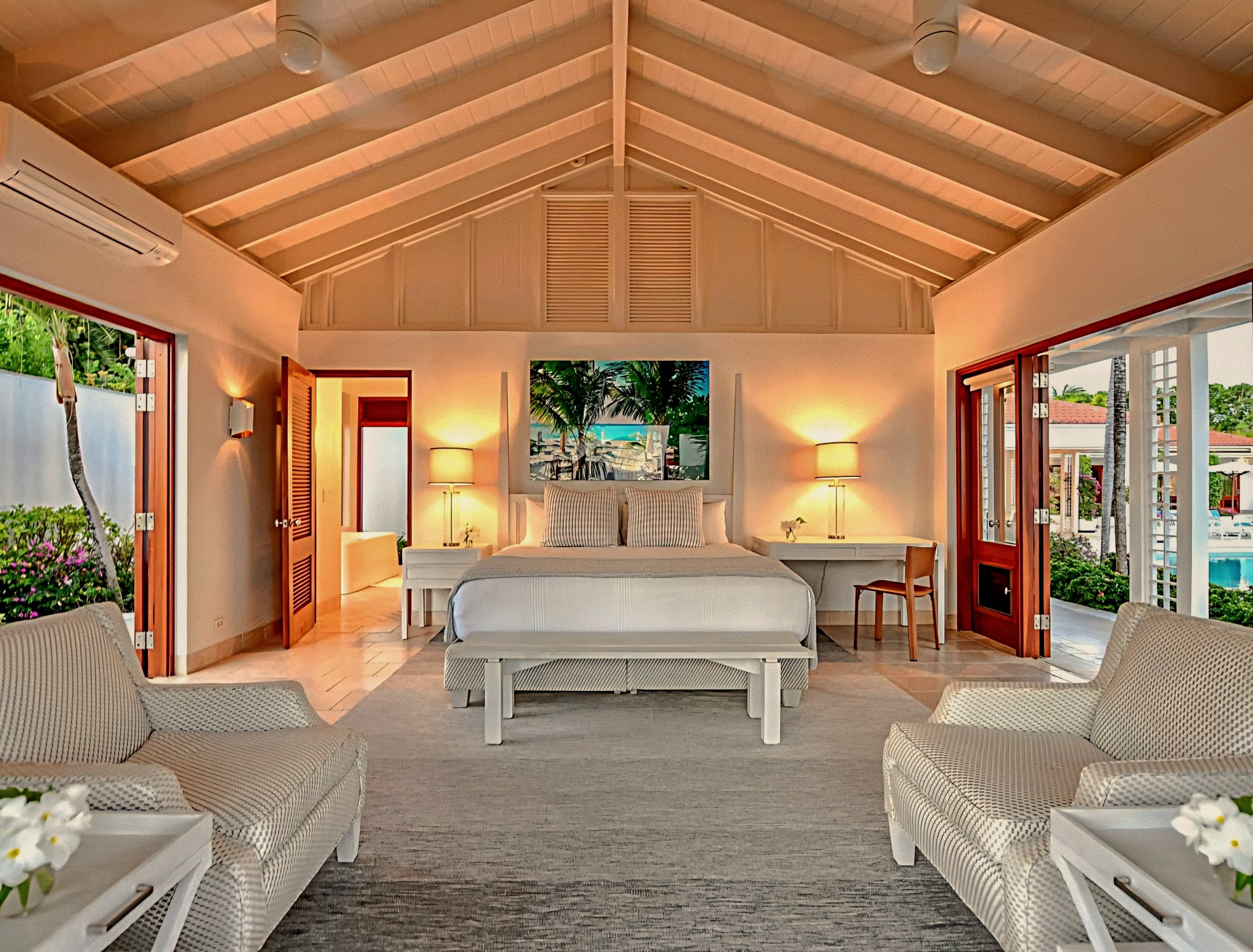 Vaulted estate bedroom suite interior at Jumby Bay luxury private island, Antigua.