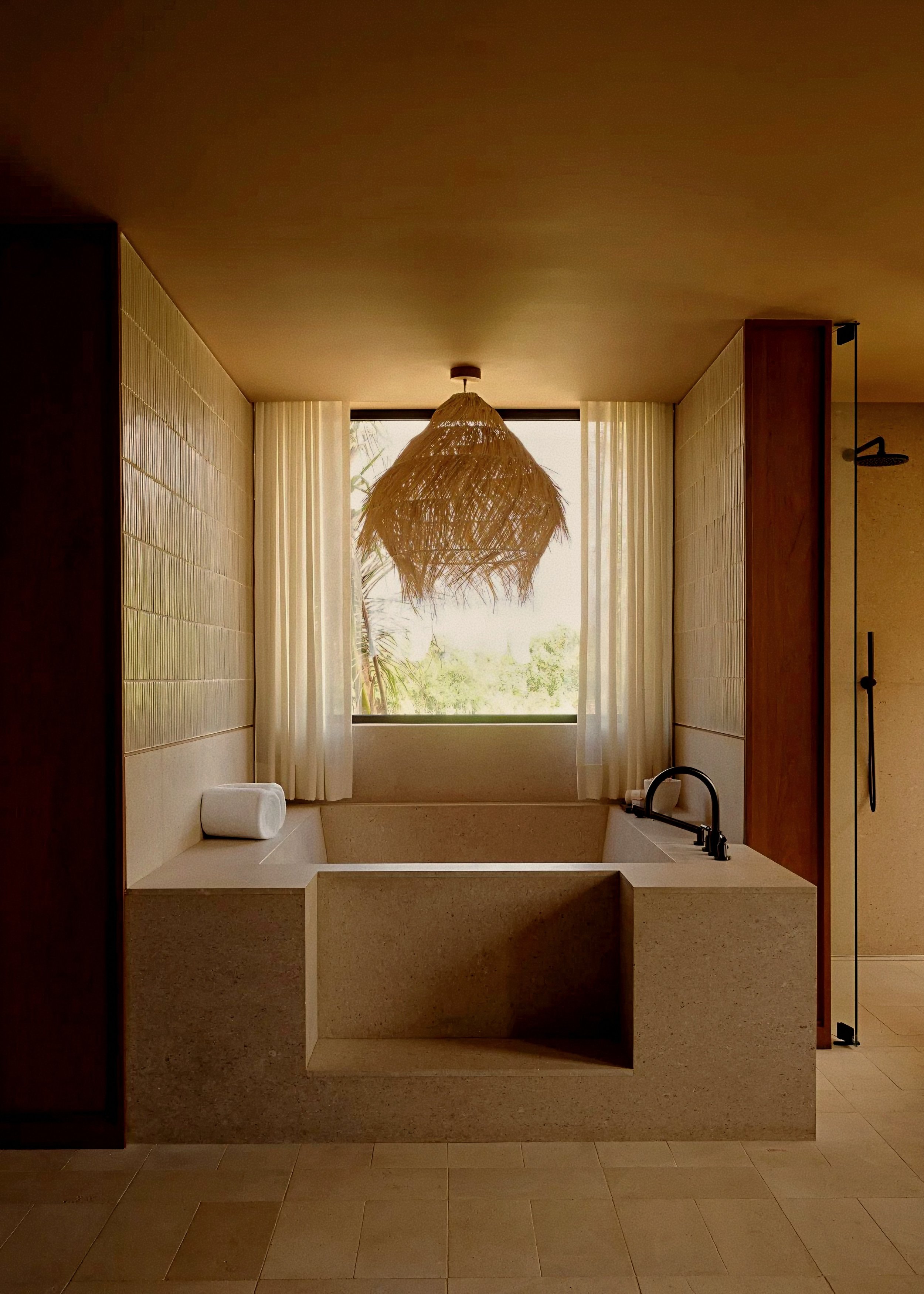 Sculptural stone tub ensuite at Rosewood Mandarina, Monteón luxury resort in Riviera Nayarit, Mexico.