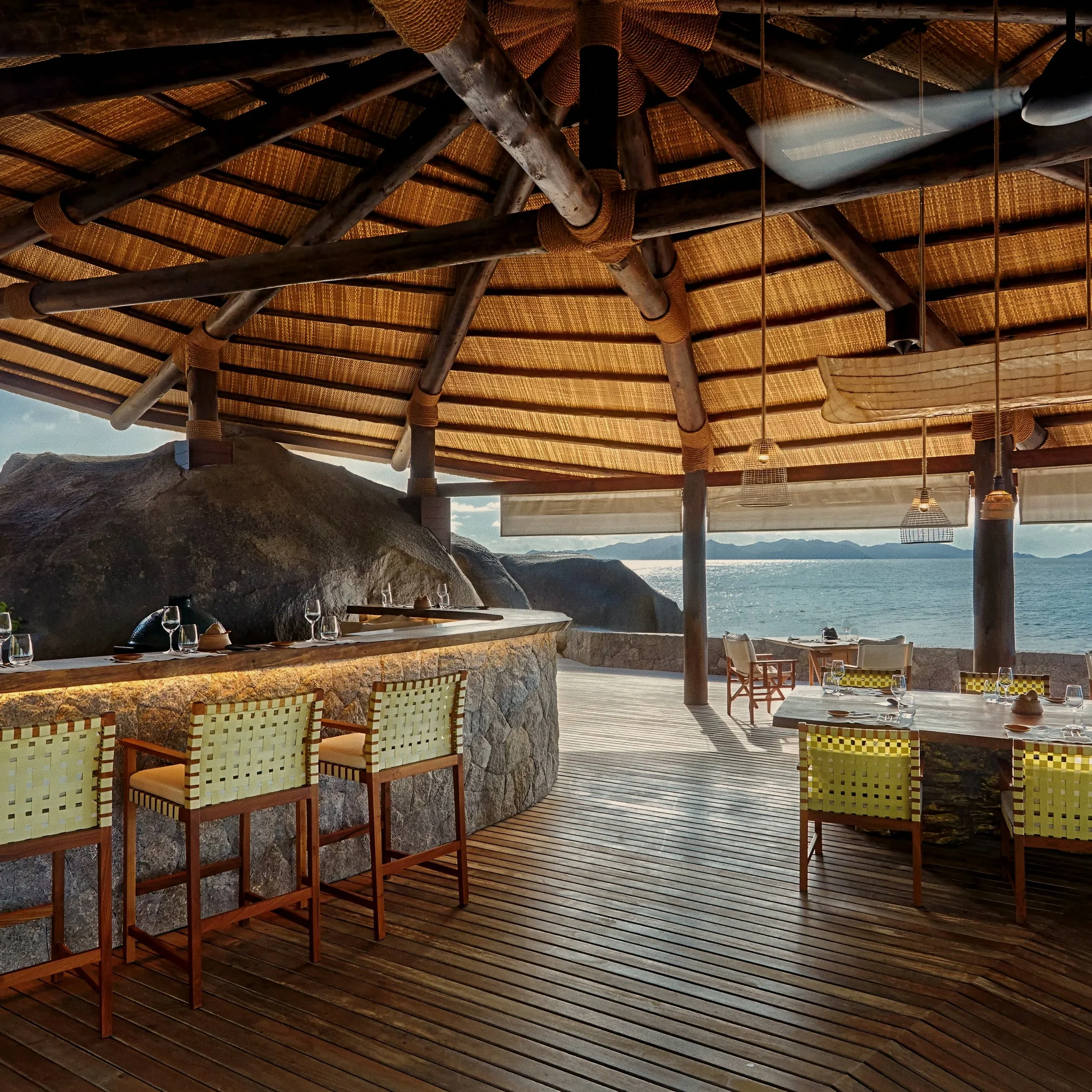 Granite and rattan Ocean Kitchen at Six Senses Zil Pasyon, Felicite Island luxury hotel in Seychelles.