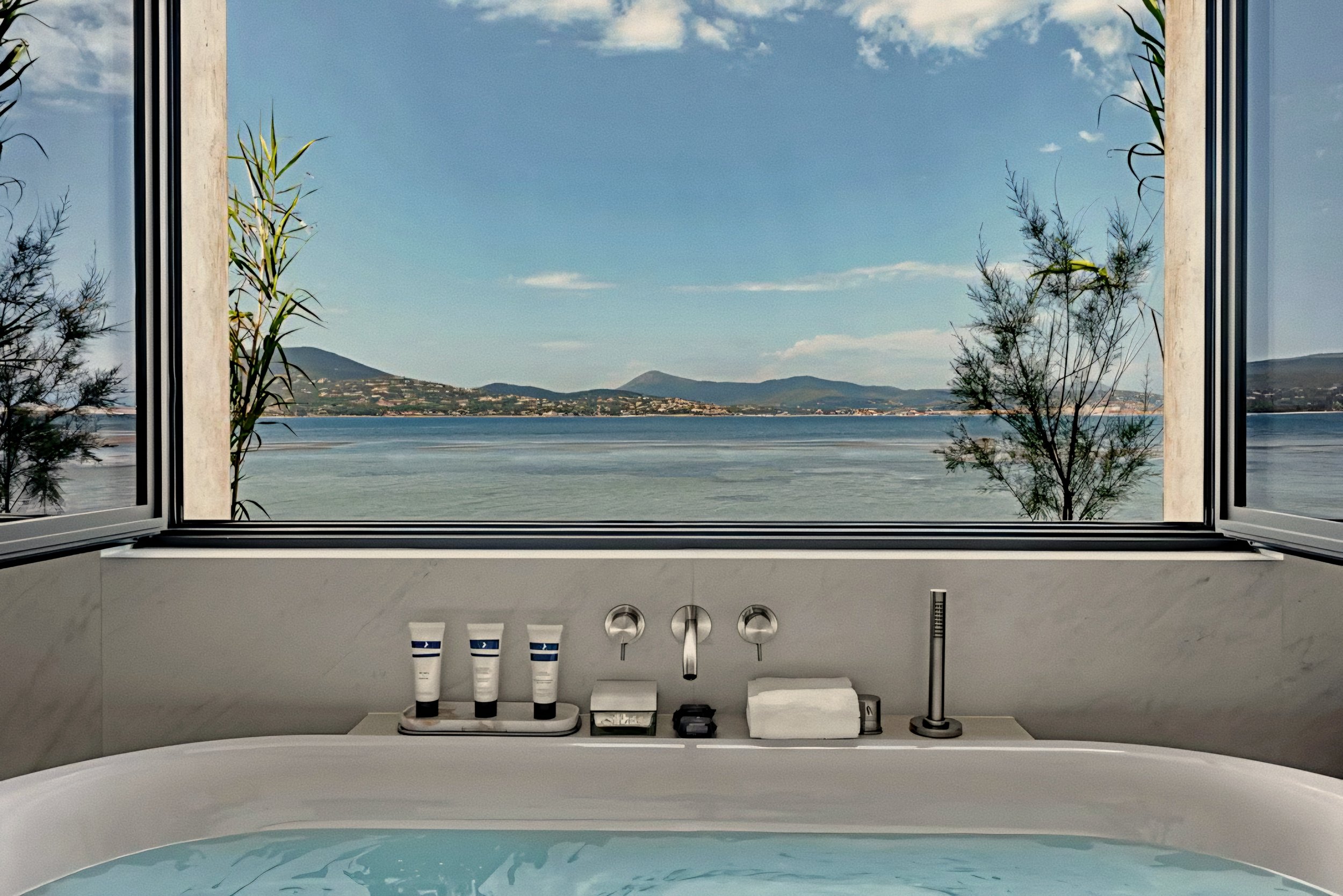 Soaking tub with sea view at Cheval Blanc St-Tropez luxury hotel, french Riviera, France.