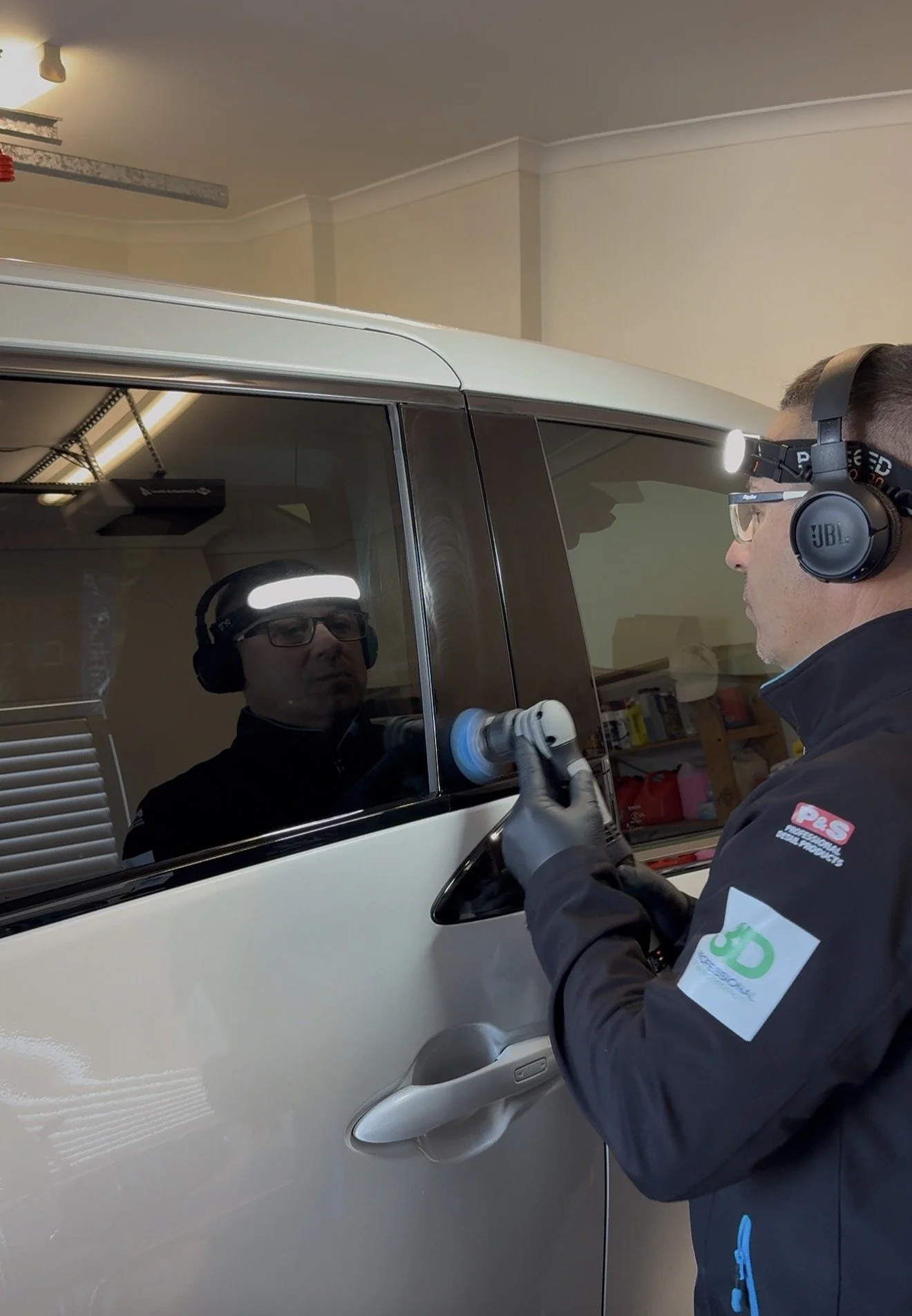 peter correcting  side pillar of a Toyota family wagon suv