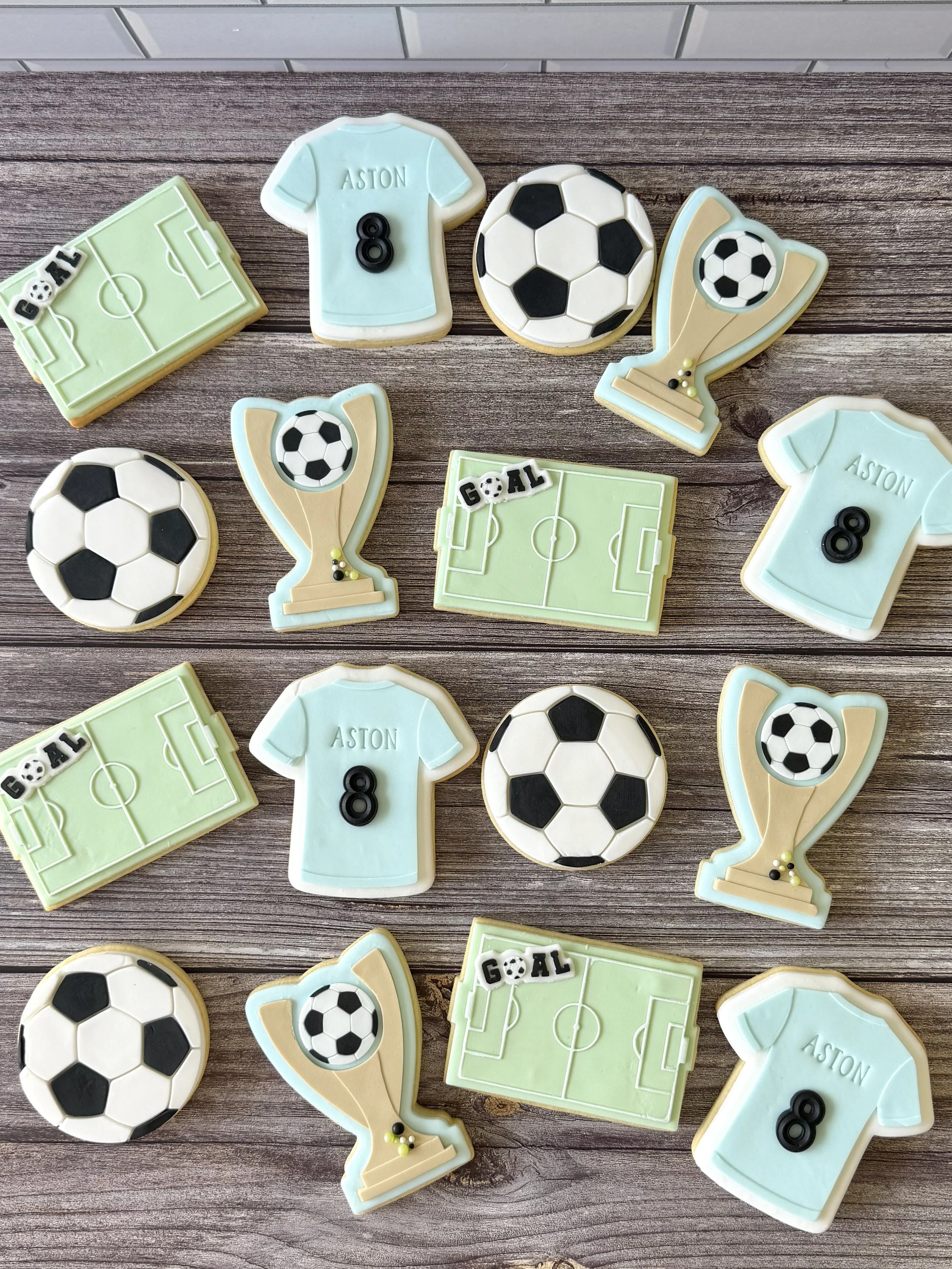 Soccer theme with trophy, jersey, soccer ball and field