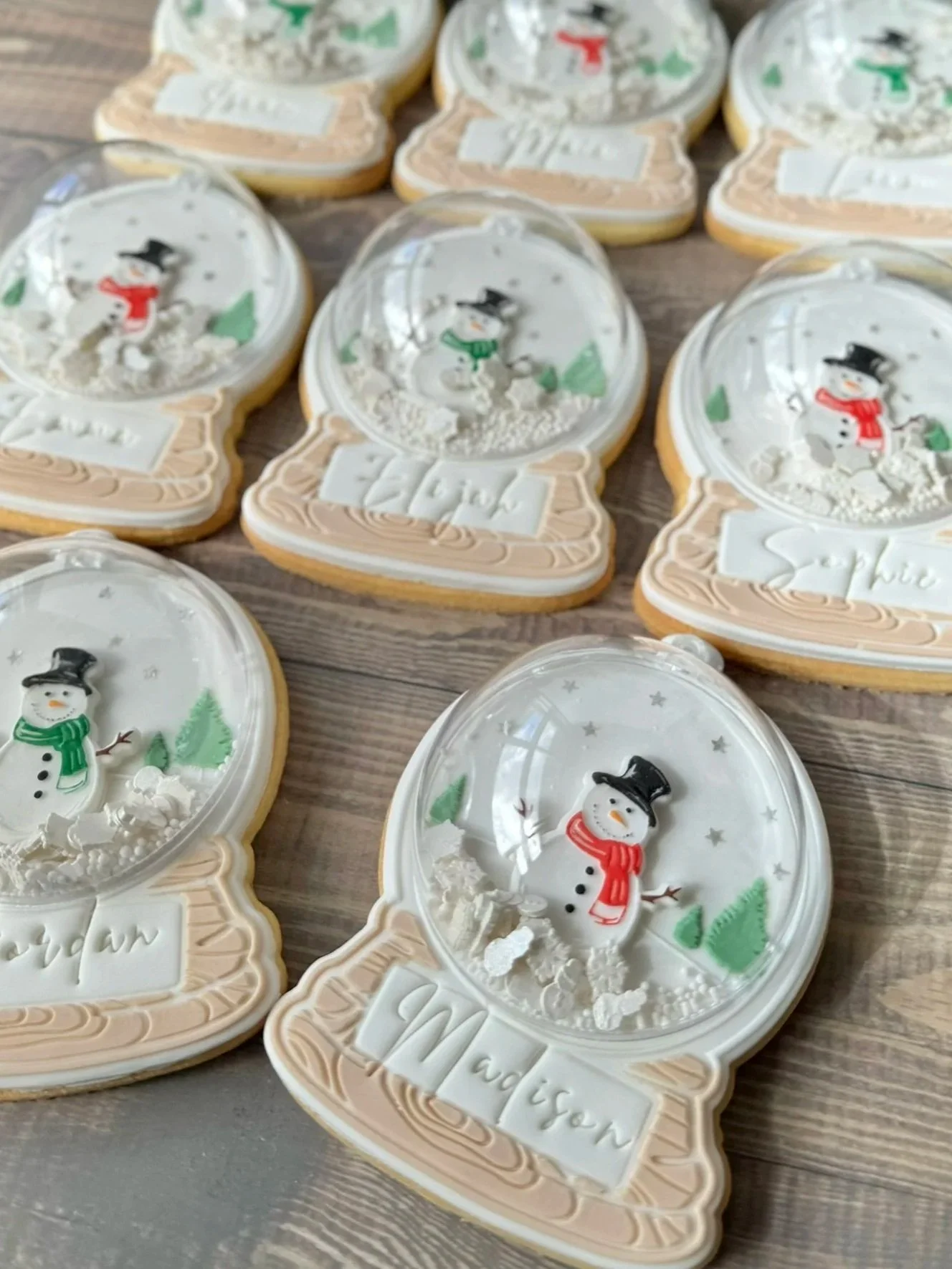 Personalised snow globe cookies complete with snowflake and sprinkle shakers