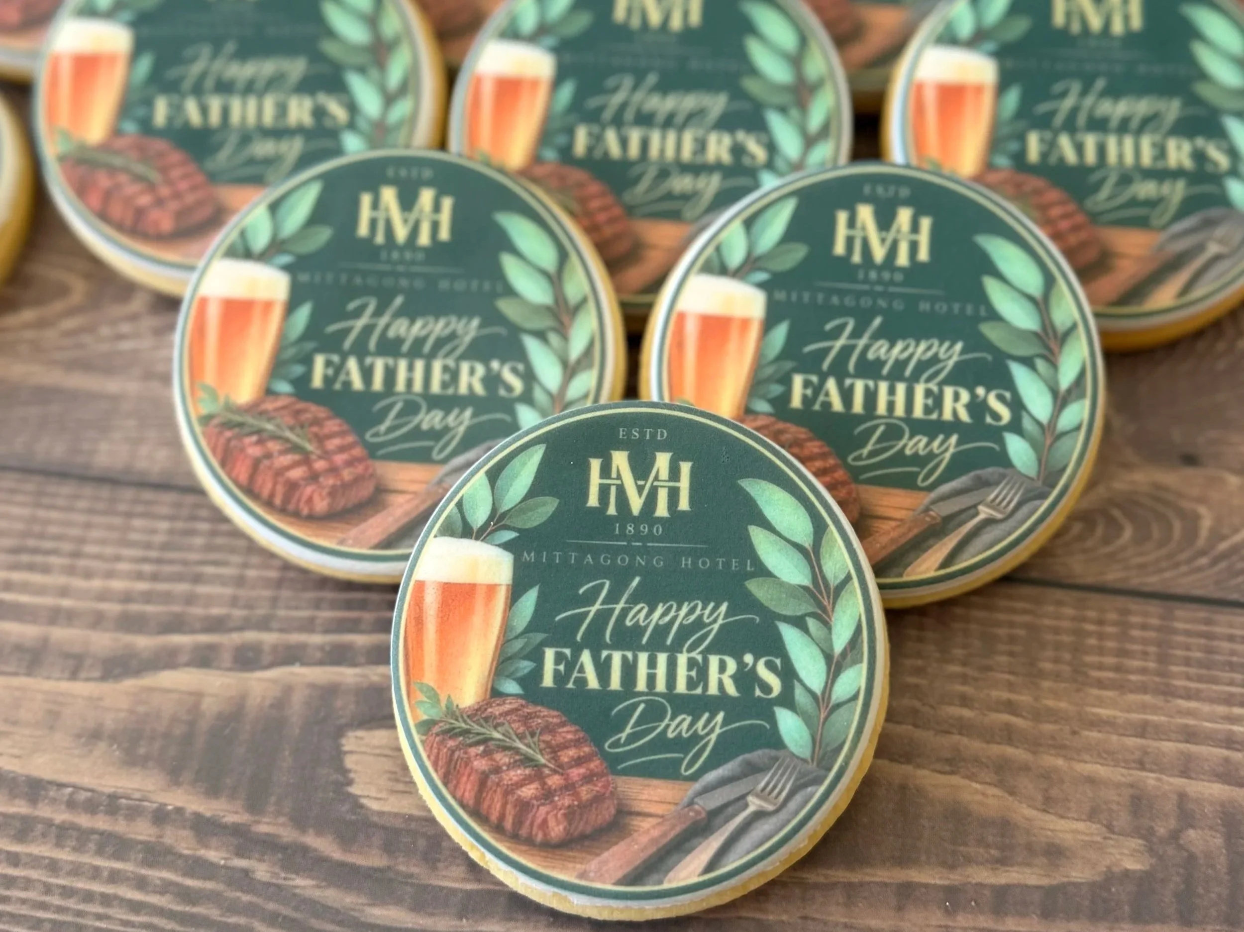 Custom branded father's day cookies created for Mittagong Hotel, featuring their logo and a personalised edible print