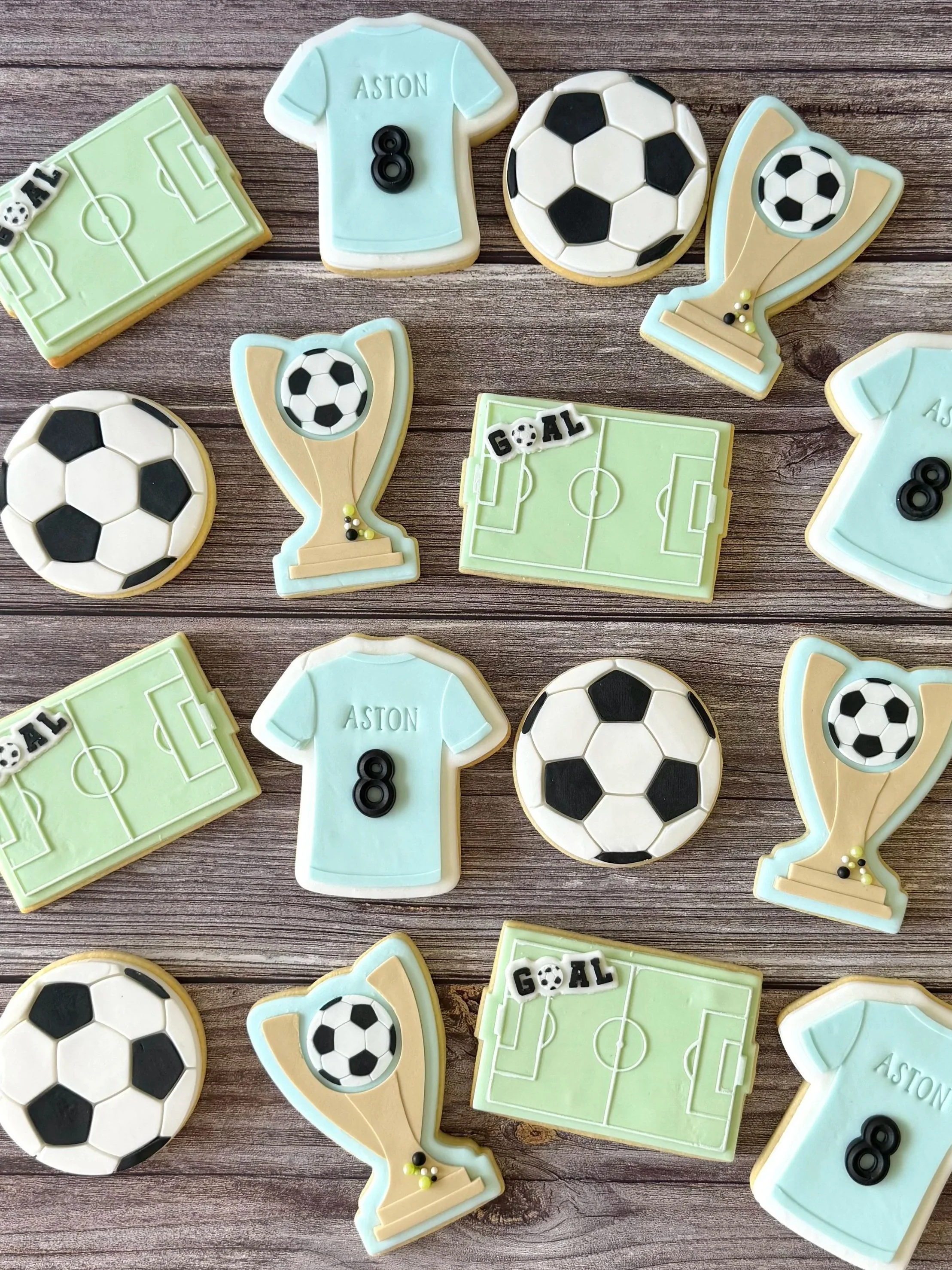 Soccer theme with trophy, jersey, soccer ball and field