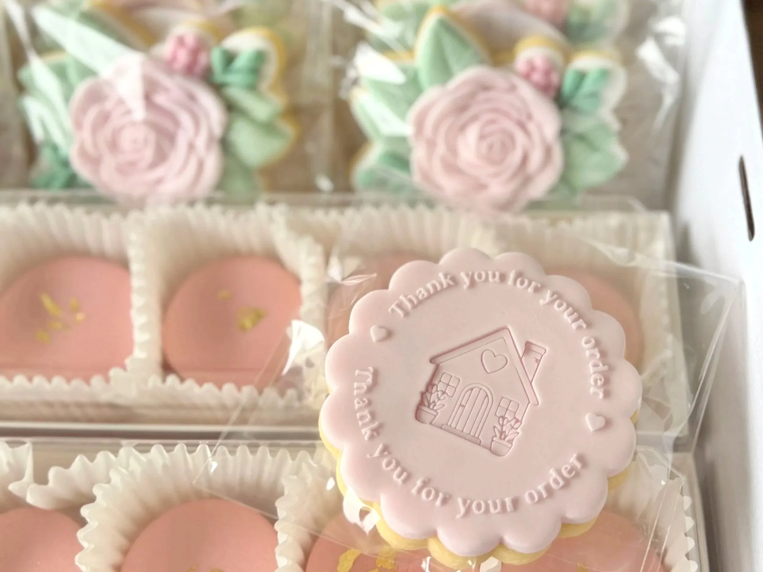 boxed thank you for your order cookie with macarons and rose cookies