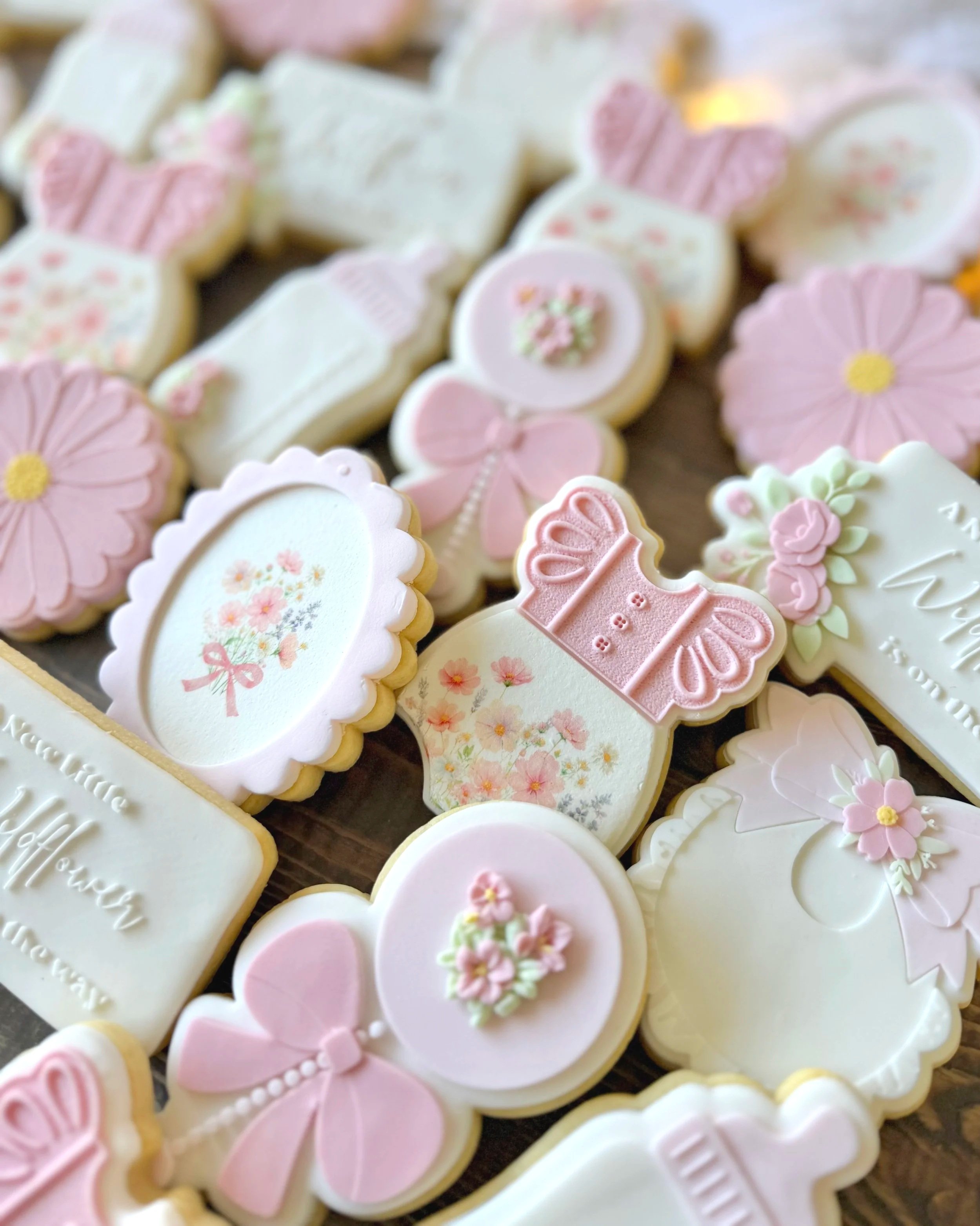 Handcrafted wildflower-themed fondant cookies for a baby shower
