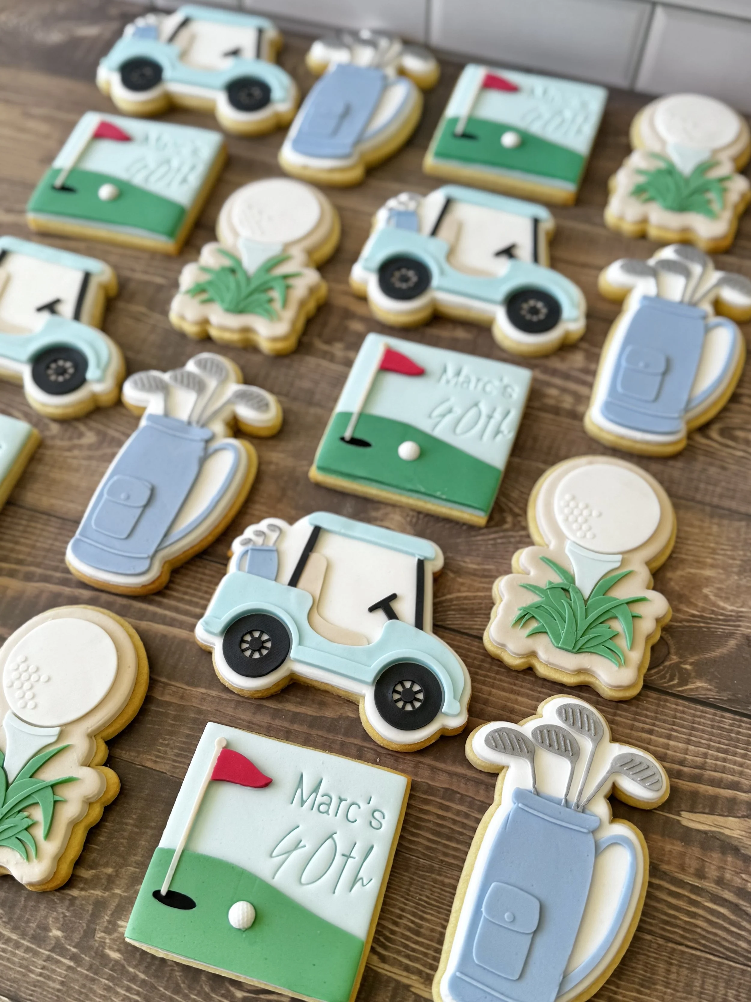 Golf themed birthday cookies with golf bag, golf cart/buggy and custom name golf scene