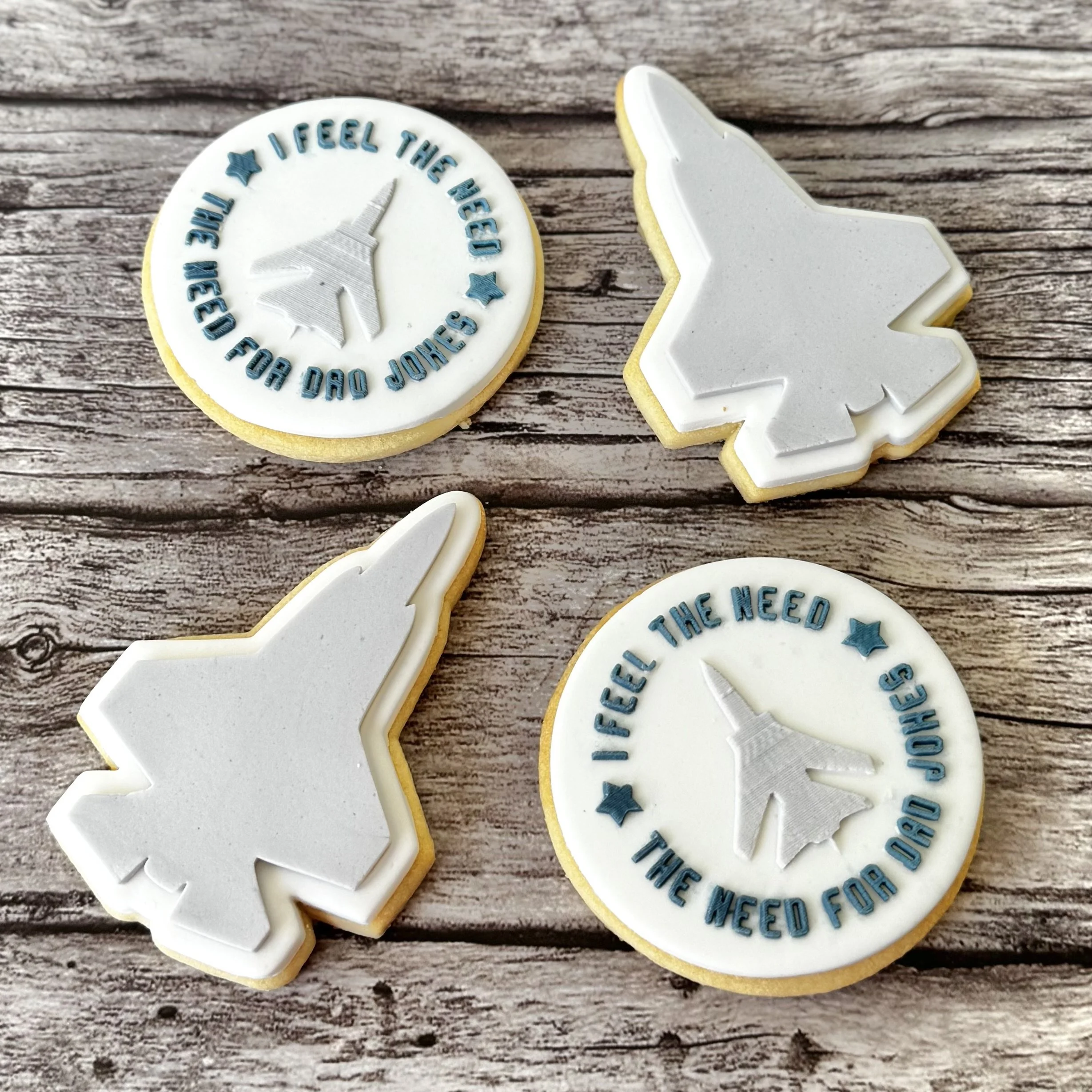 Father's Day cookies with a message 'I feel the need... the need for Dad jokes' and a jet 