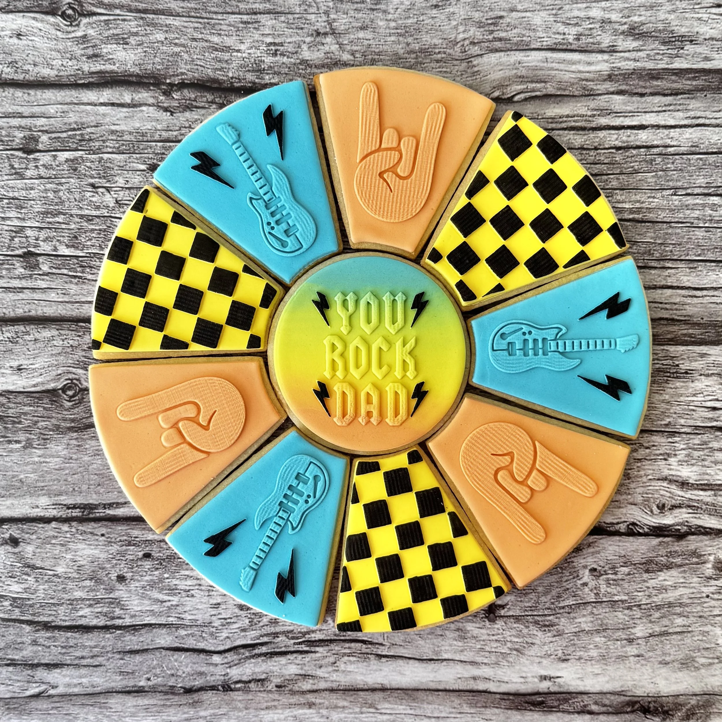 A Father's Day cookie platter with 'Dad, You Rock'