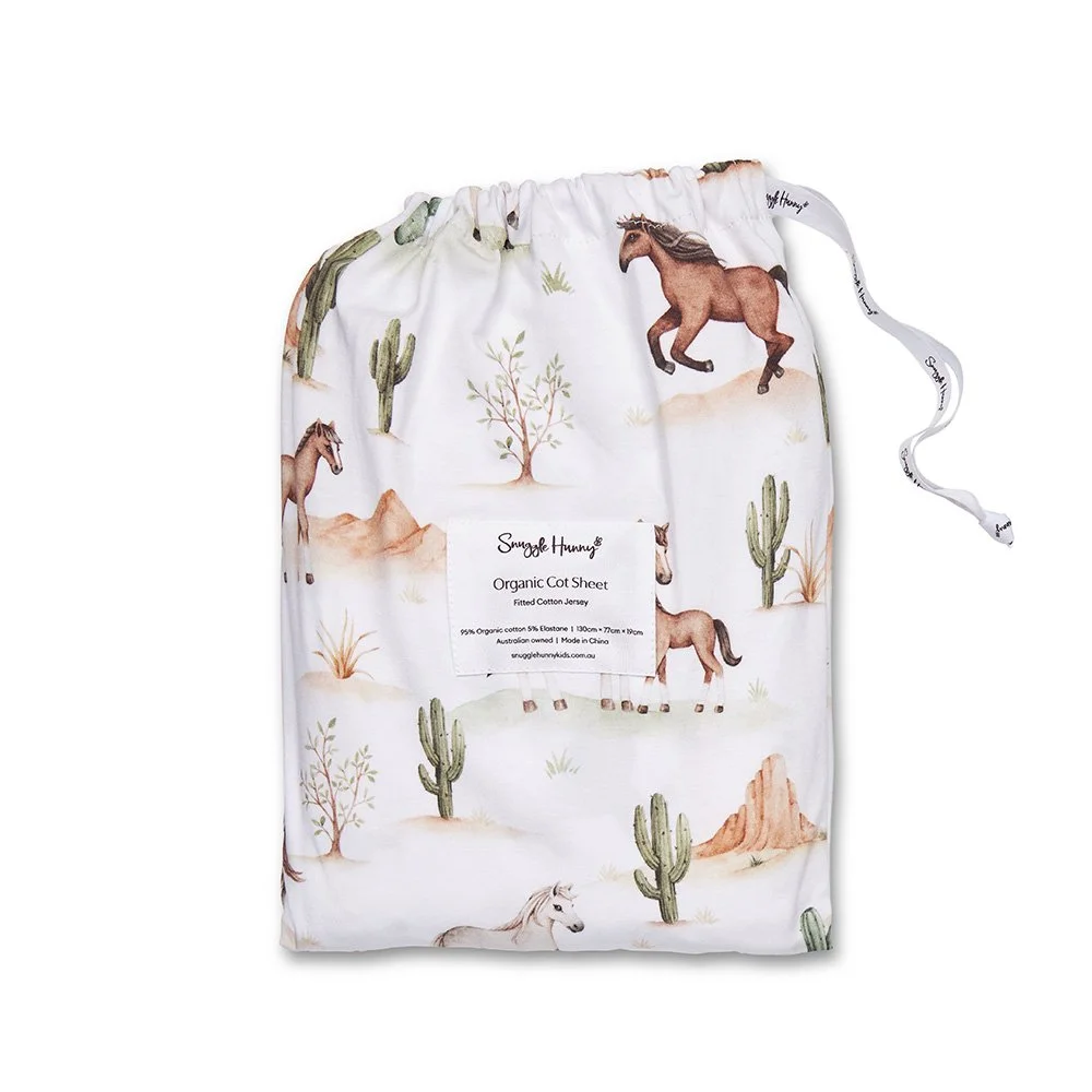 wild-horses-cot-sheet-flatlay.jpg