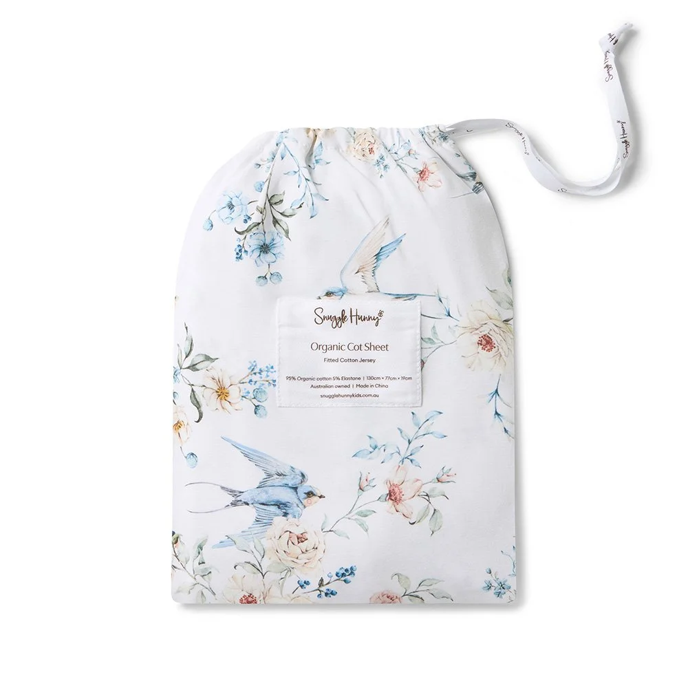 sweet-swallows-cot-sheet-flatlay.jpg