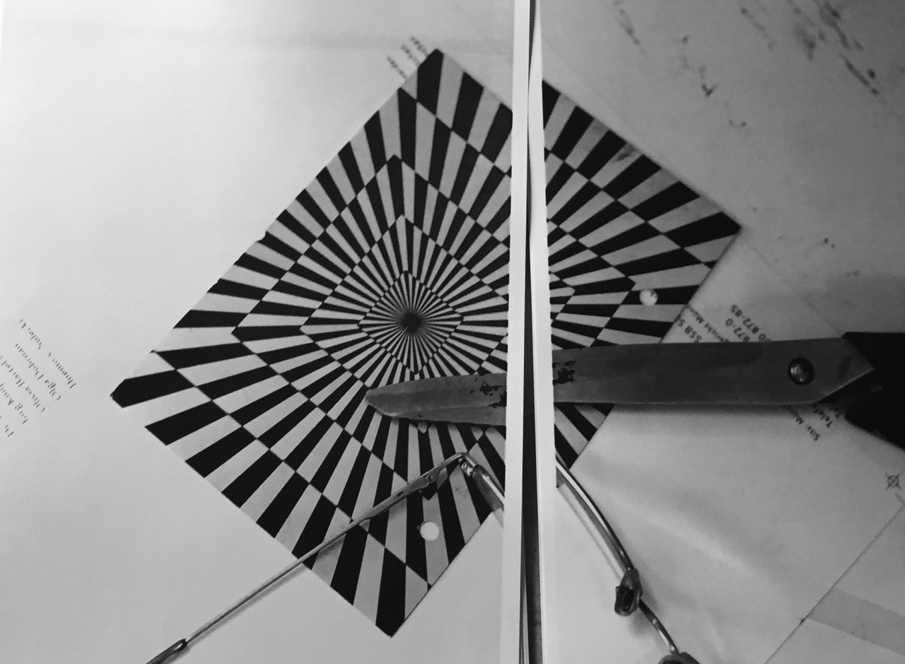 A geometric problem worked through by hand on paper