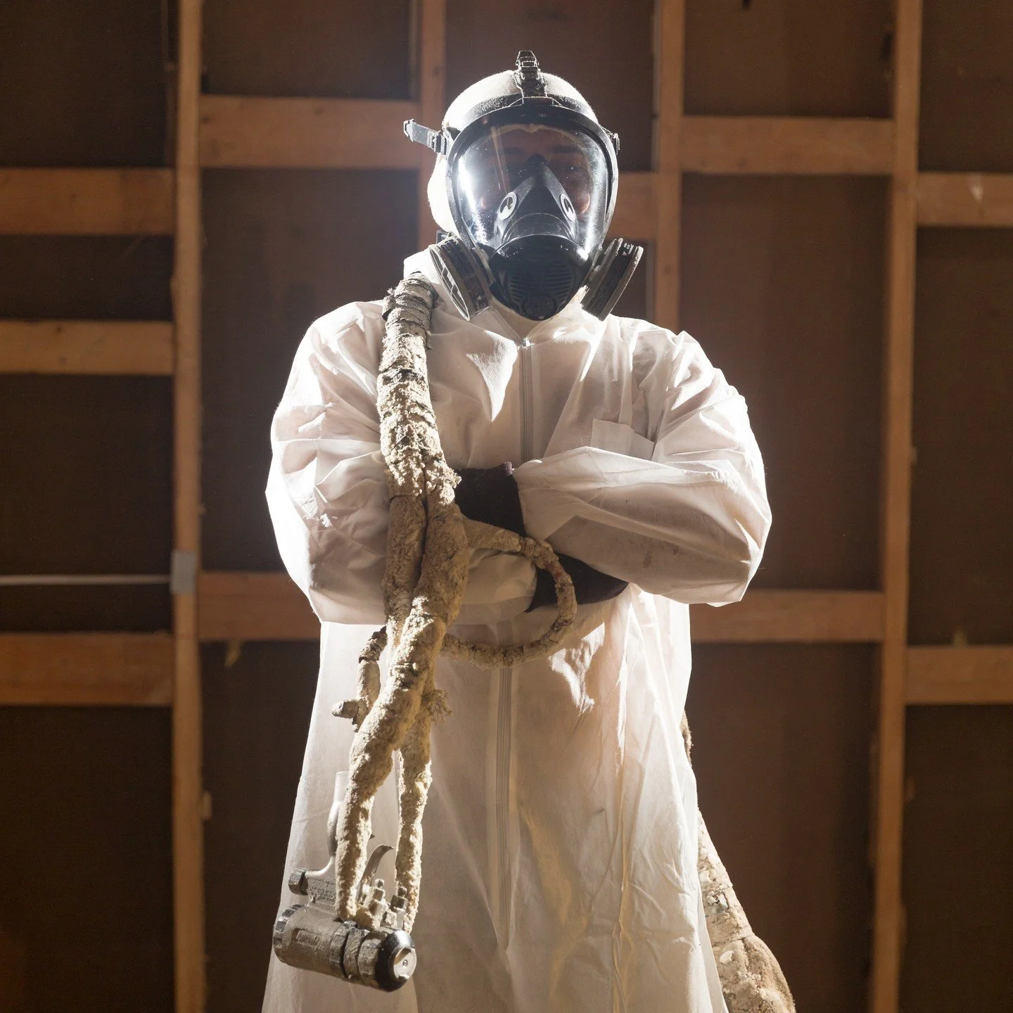 You can't inspect insulation. It goes in, it's behind drywall soon after, and from then on you're taking somebody's word for it. Which leaves the person in the respirator as the only part of the job you actually get to look at. Nobody sees this wall 