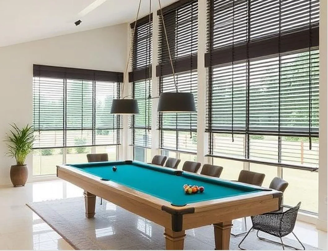 Large family room with large windows with modern venetian blinds in Georgetown , Guyana.