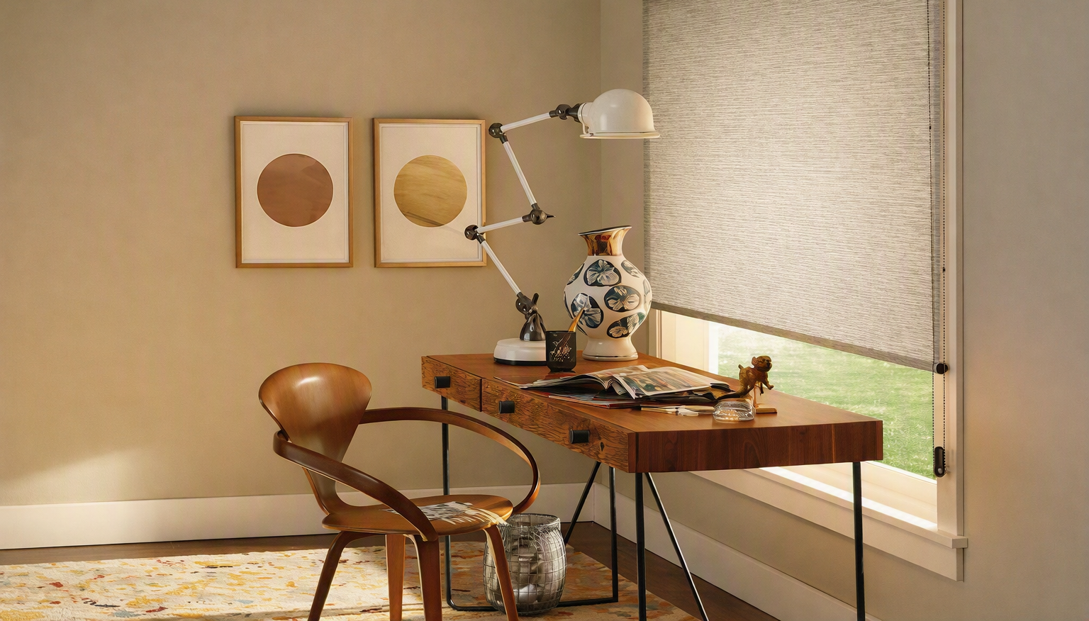 A home office with a solar roller shade that helps to protect against harmful UV Rays and sun glare -and helps with energy efficiency in Georgetown , Guyana