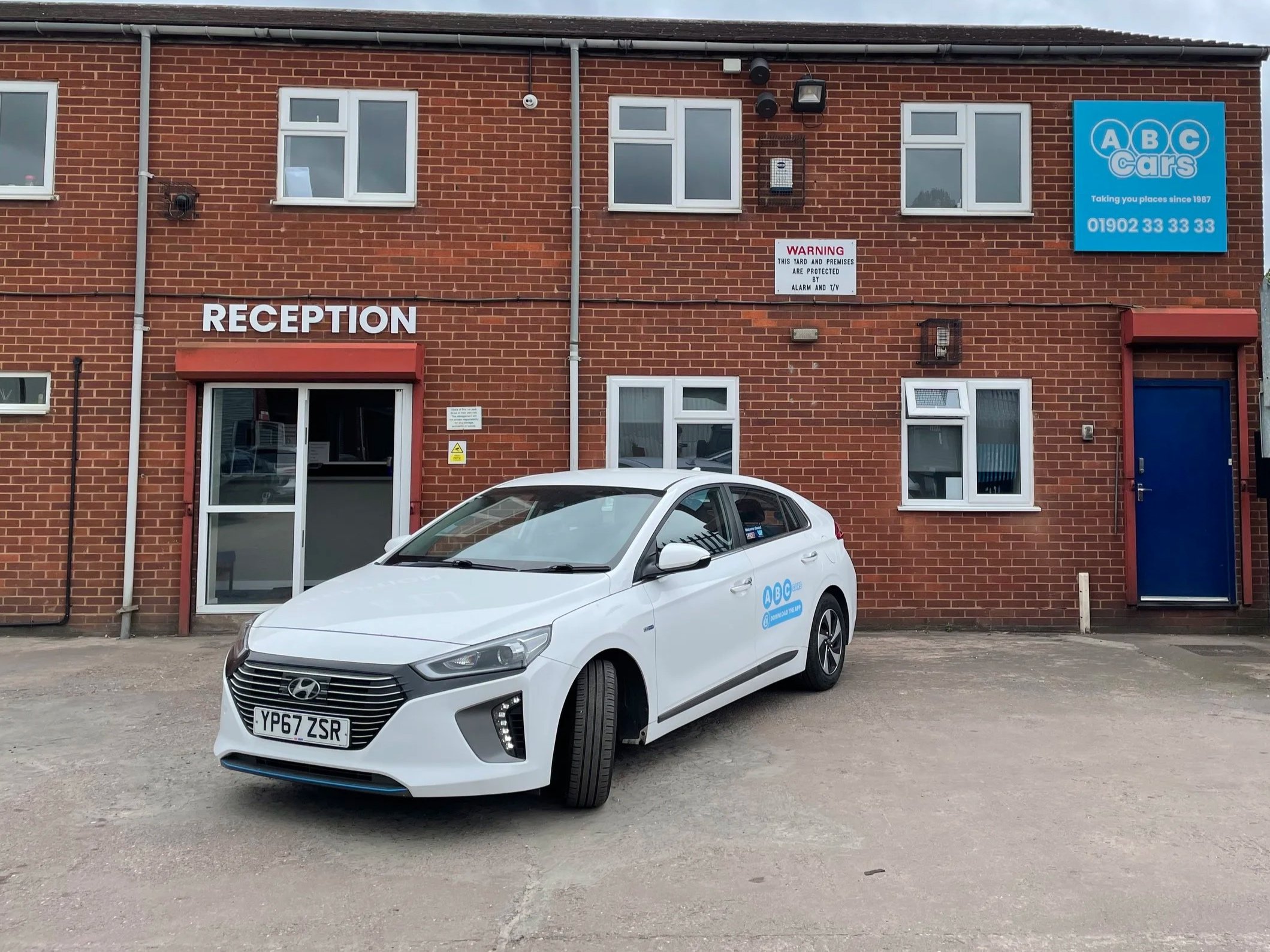 A white Hyundai Taxi rental vehicles available in Wolverhampton and the Midlands.