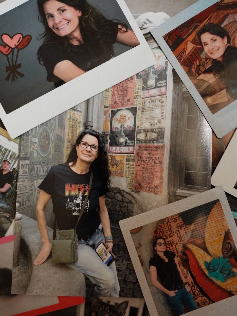 Photographs of a woman with dark hair, glasses, and casual clothing, taken in various settings, including a graffiti wall and art installations.