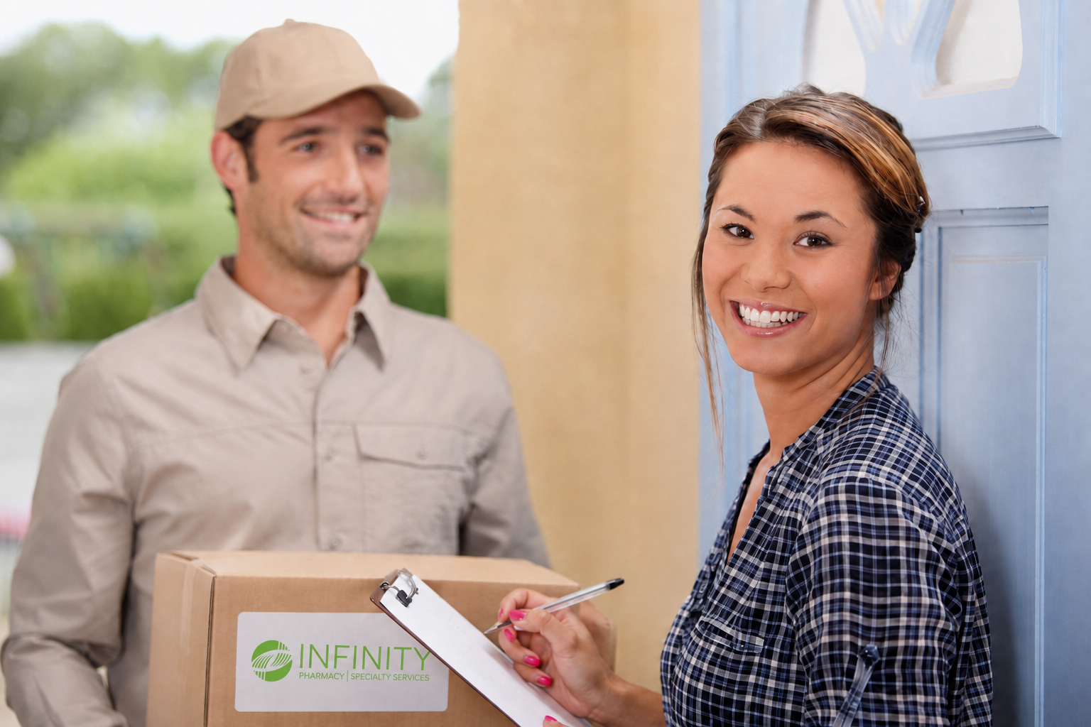 A woman smiling and holding a clipboard, standing by a blue door, with a delivery man in the background holding a box labeled "Infinity Pharmacy Specialty Services."