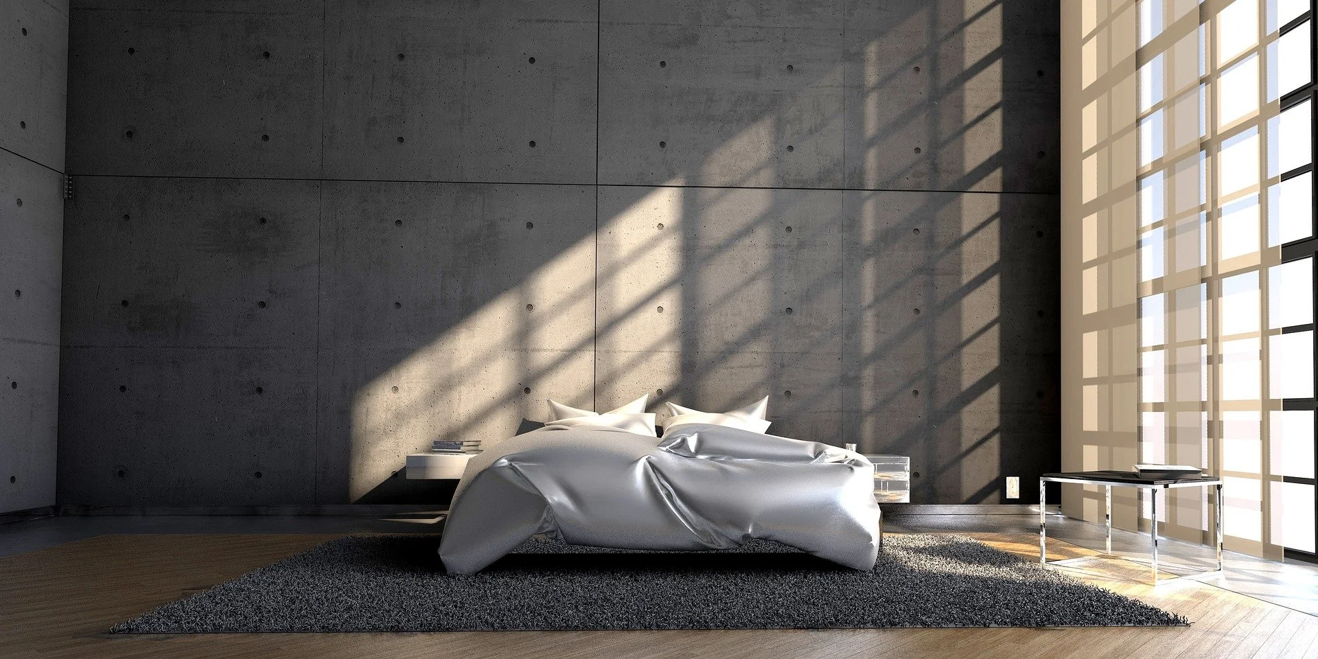 Modern bedroom with concrete wall, large window with grid pattern, sunlight casting shadows, bed with satin sheets, and side tables.