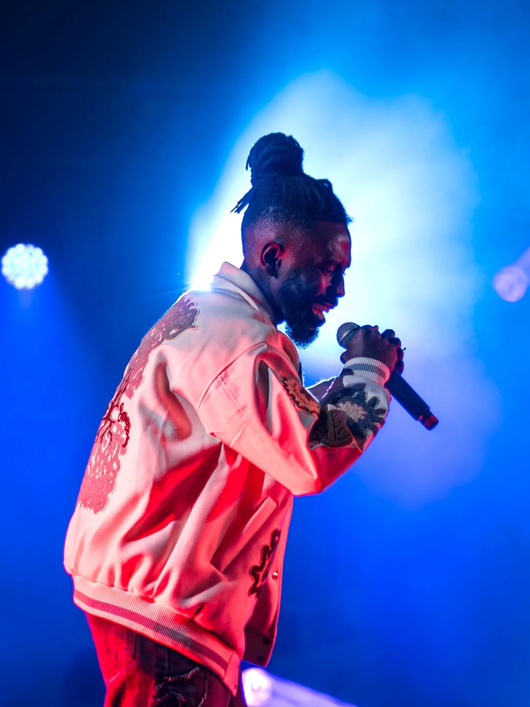 A man performing on a stage