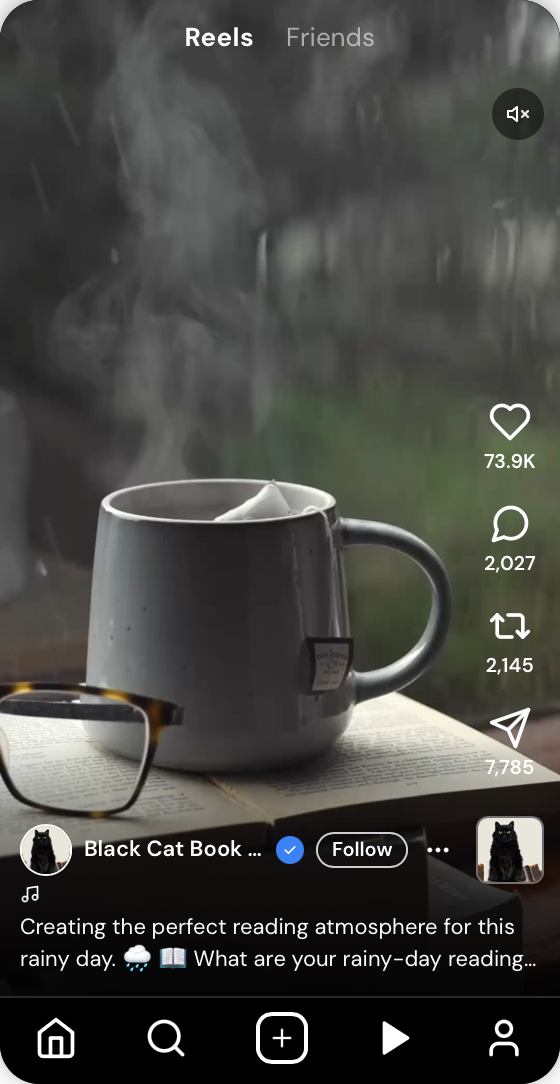 A steaming white mug on a book with glasses beside it, on a window sill during a rainy day.