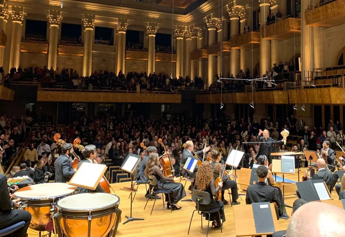 City Choir Artistic Director Erin Freeman acknowledging standing ovation at Sala São Paulo in São Paulo, Brazil.